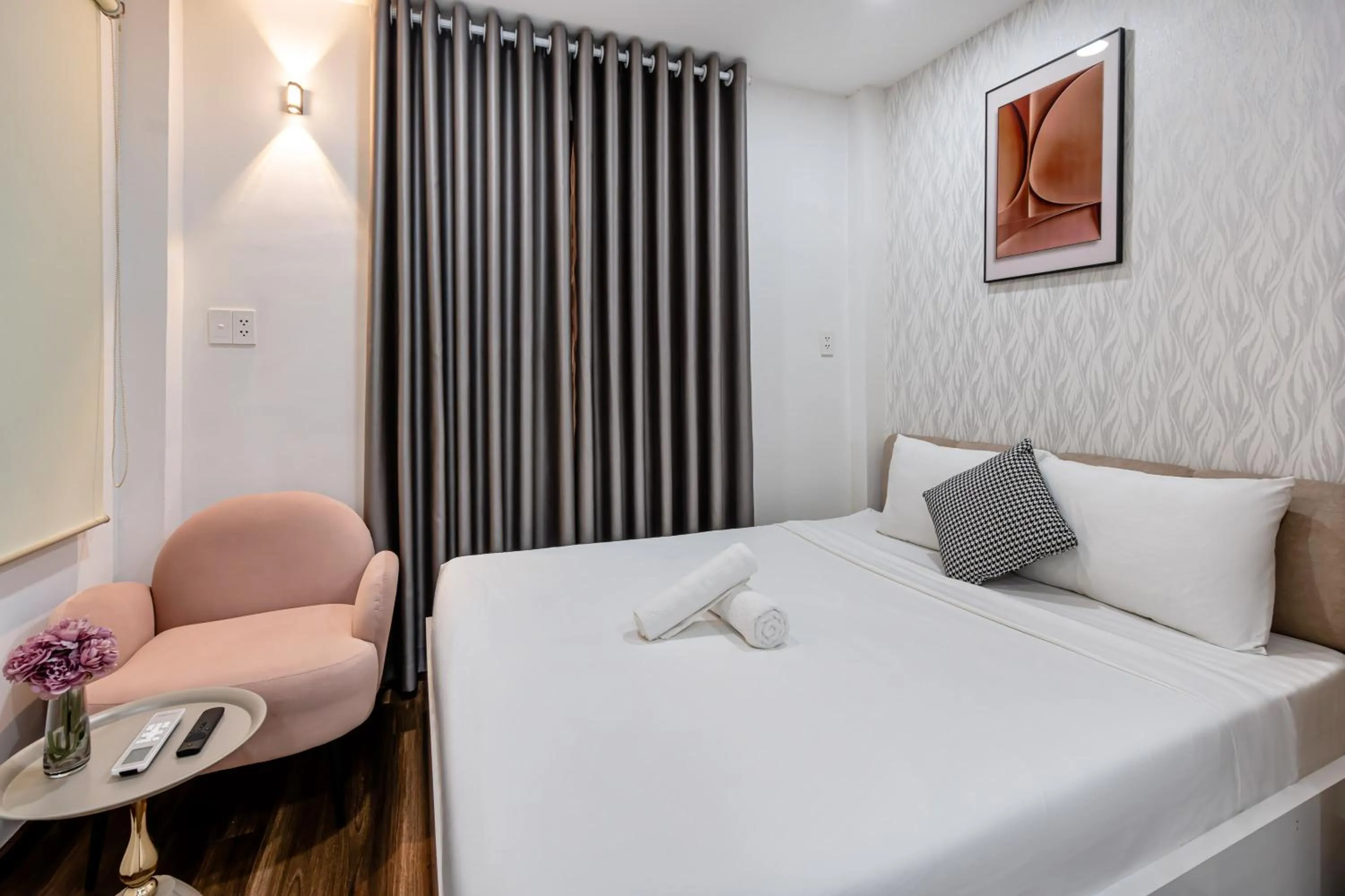 Bed in Lotus Lalala Inn Hotel