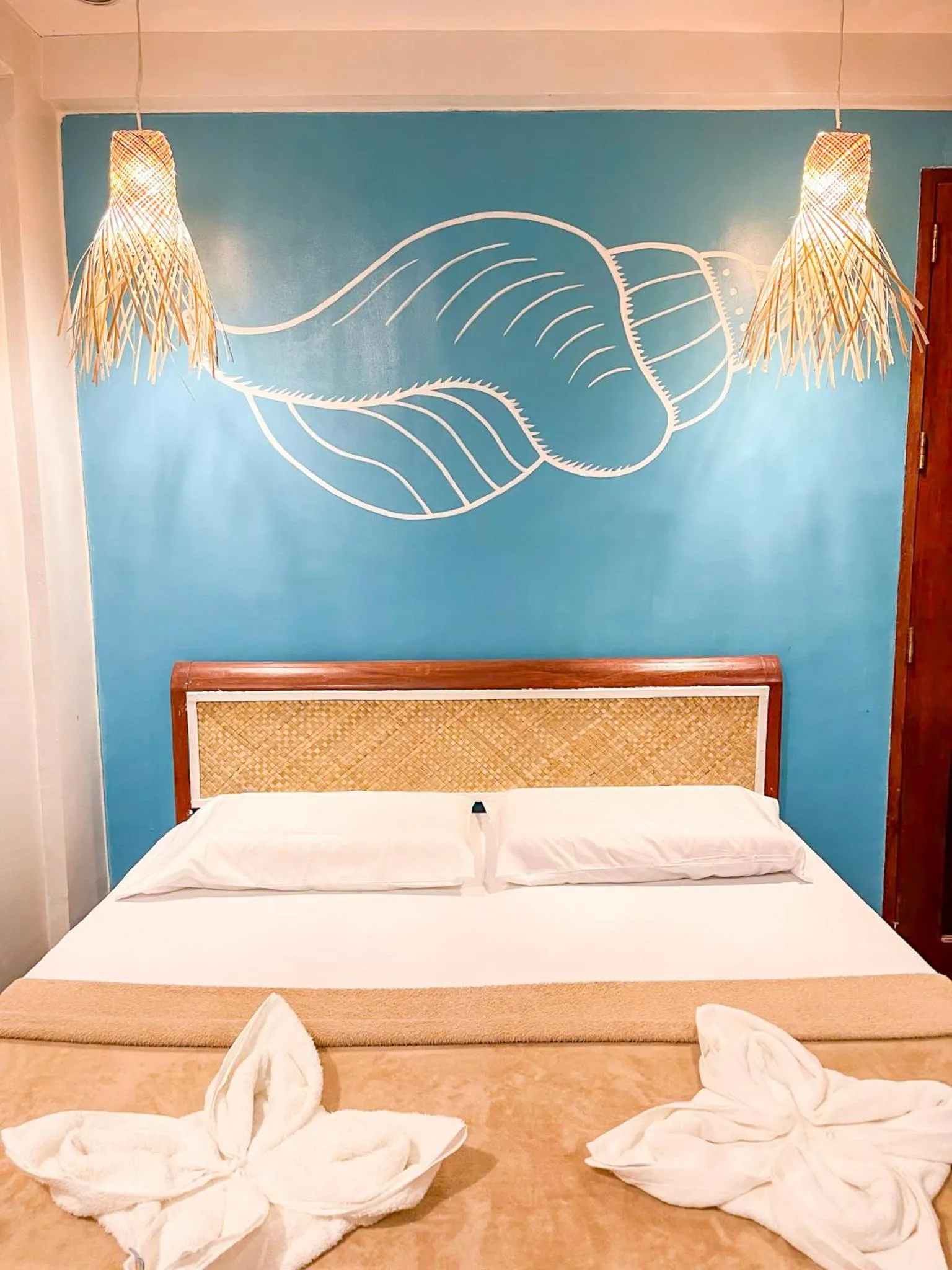 Bed in Amos Portside Inn El Nido