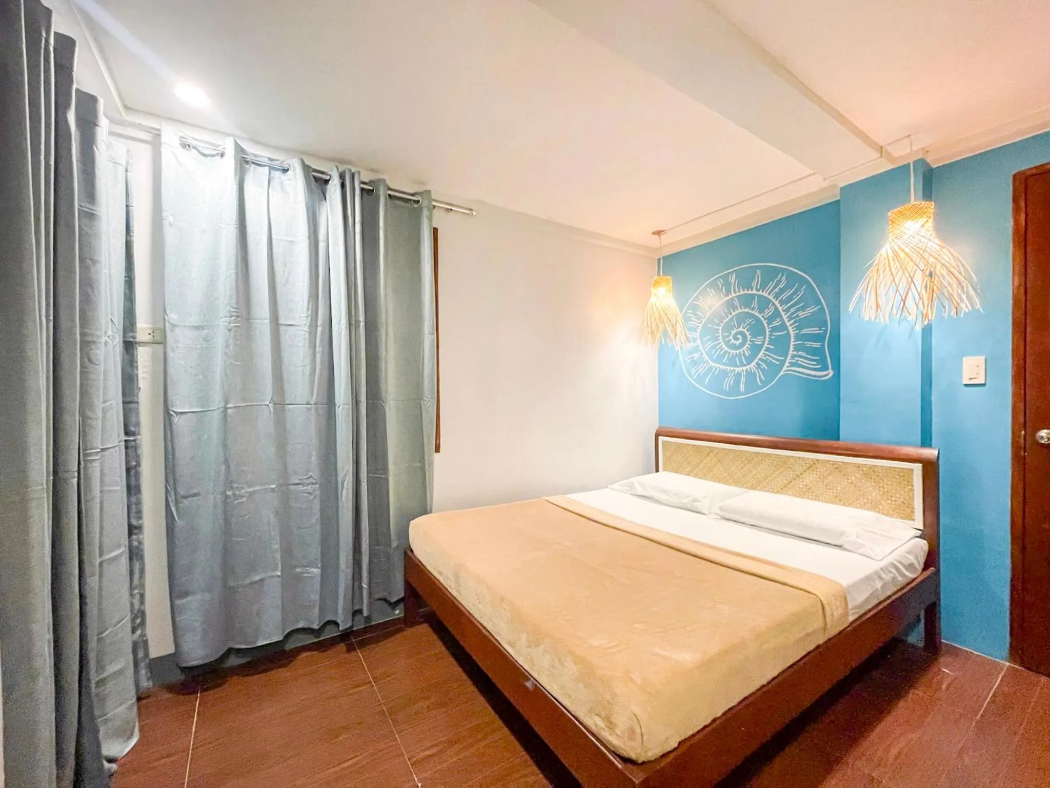 Bed in Amos Portside Inn El Nido