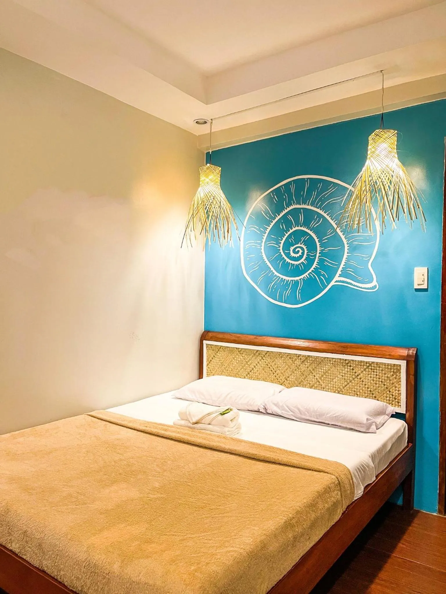 Bed in Amos Portside Inn El Nido