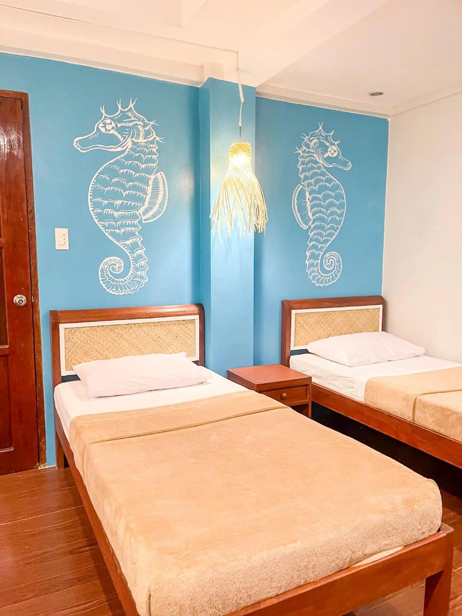 Bed in Amos Portside Inn El Nido