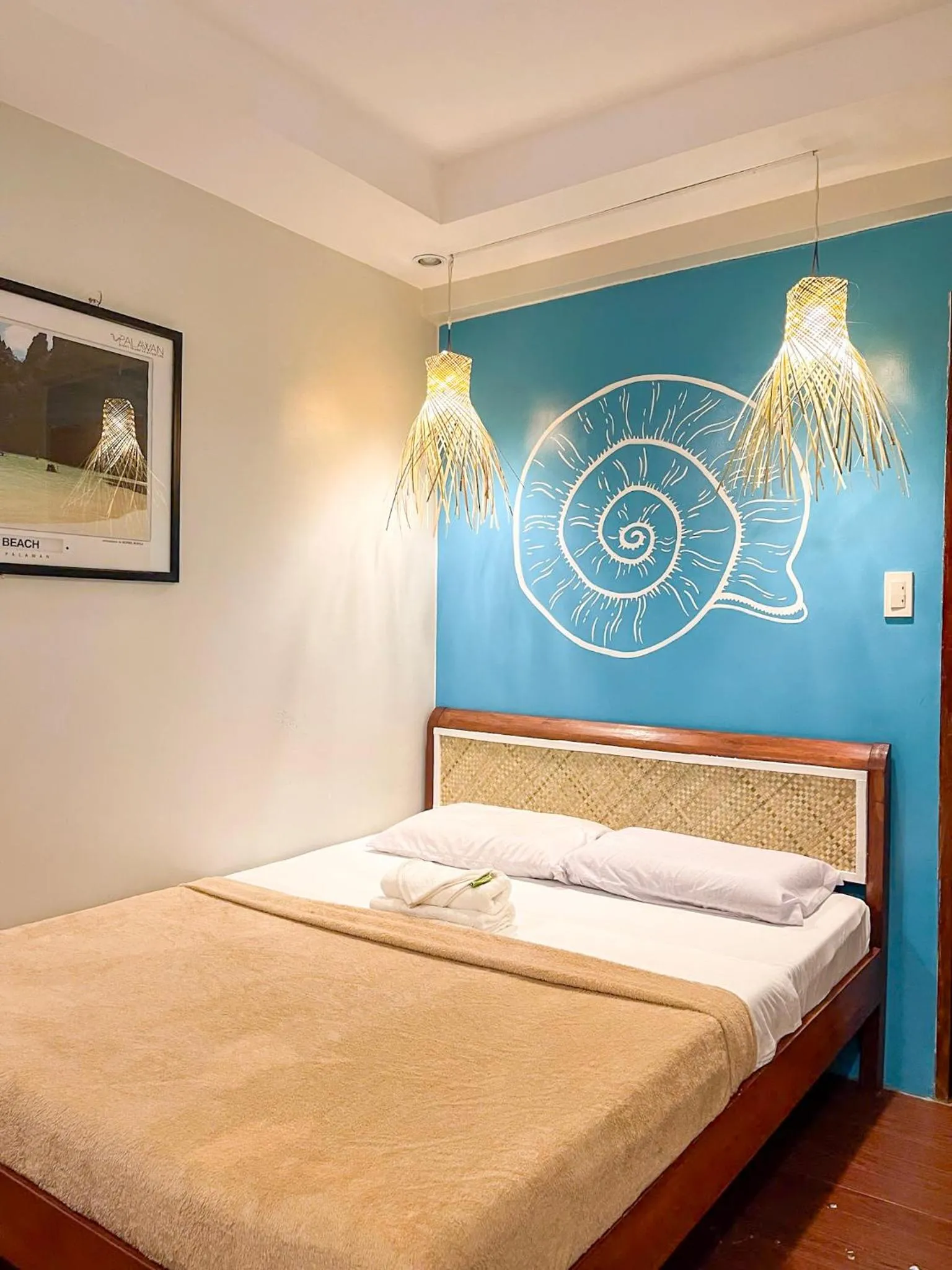 Bed in Amos Portside Inn El Nido