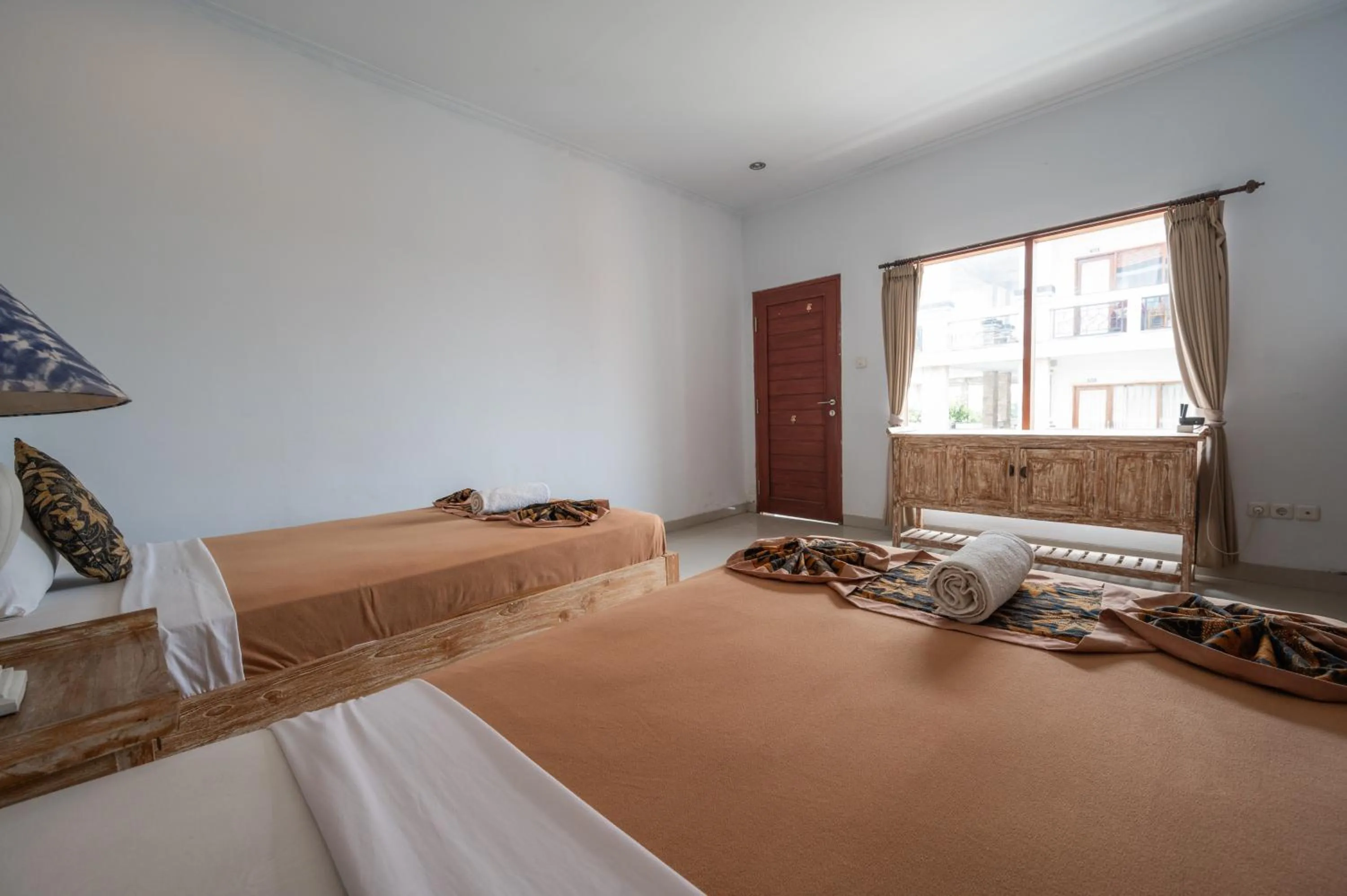 Bedroom, Bed in Agung Homestay Canggu Mitra RedDoorz