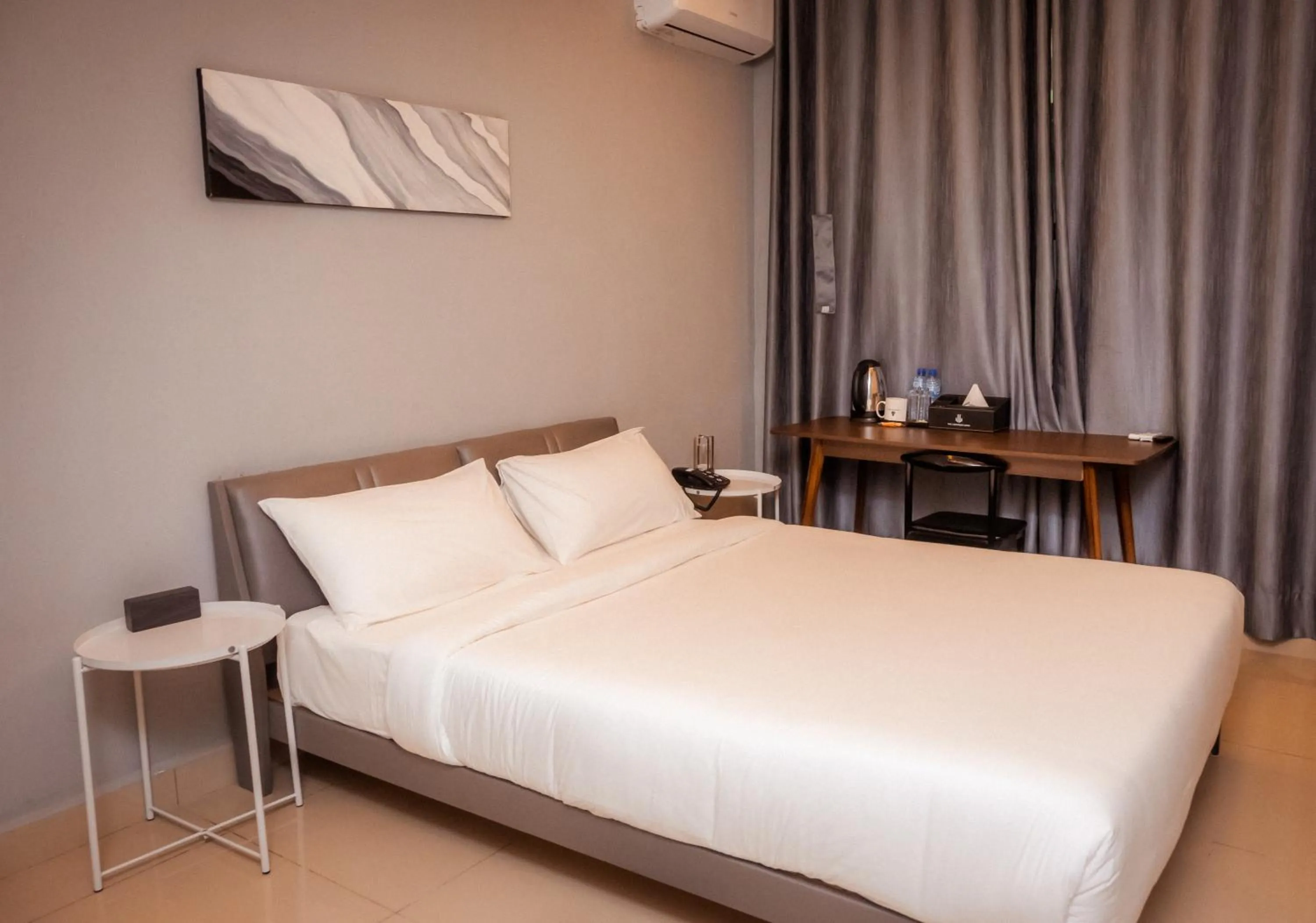 Bed in The L Boutique Tz