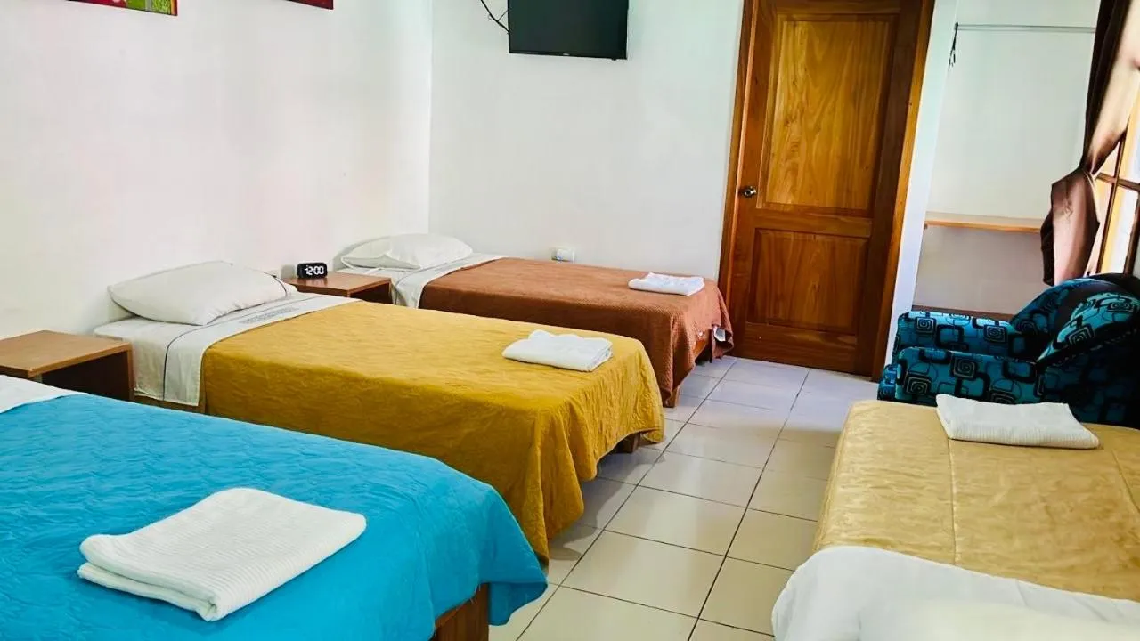 Bed in The Galapagos Pearl B&B