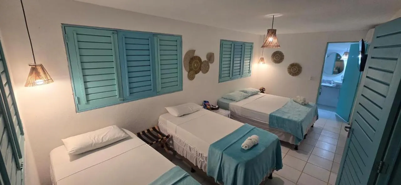 Bed in Amaly Pousada
