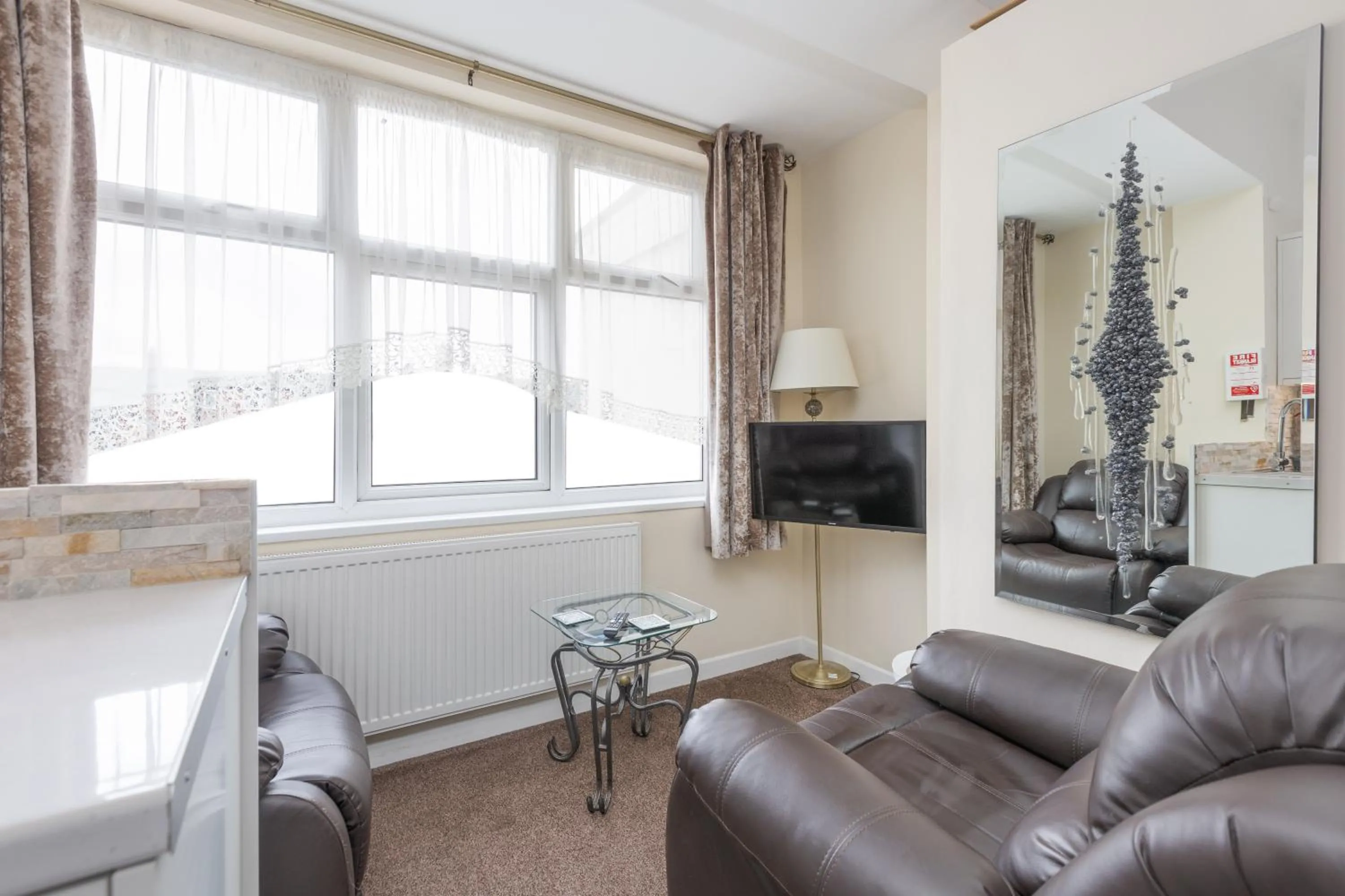 Living room in Beachcliffe Holiday Apartments