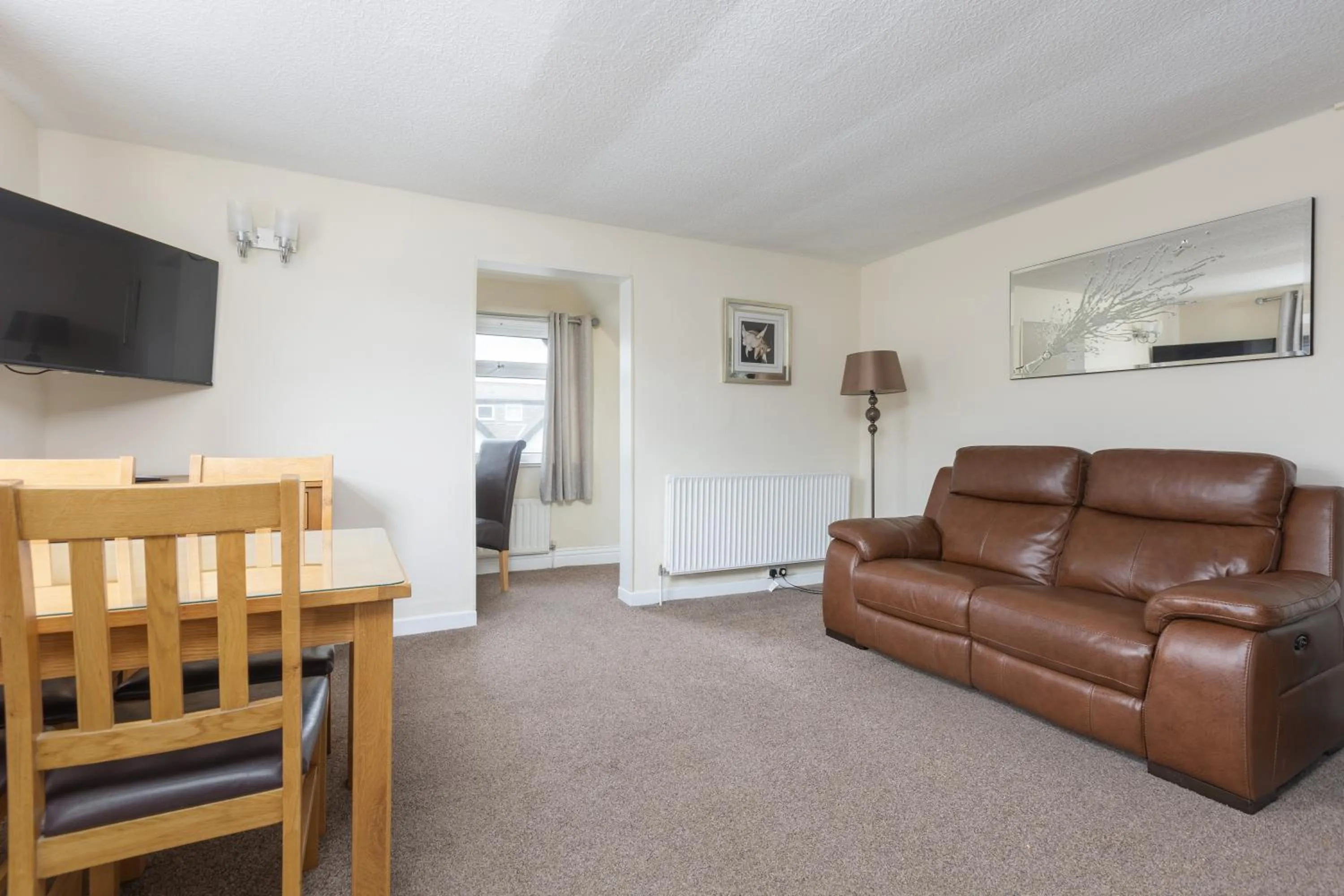 Living room in Beachcliffe Holiday Apartments