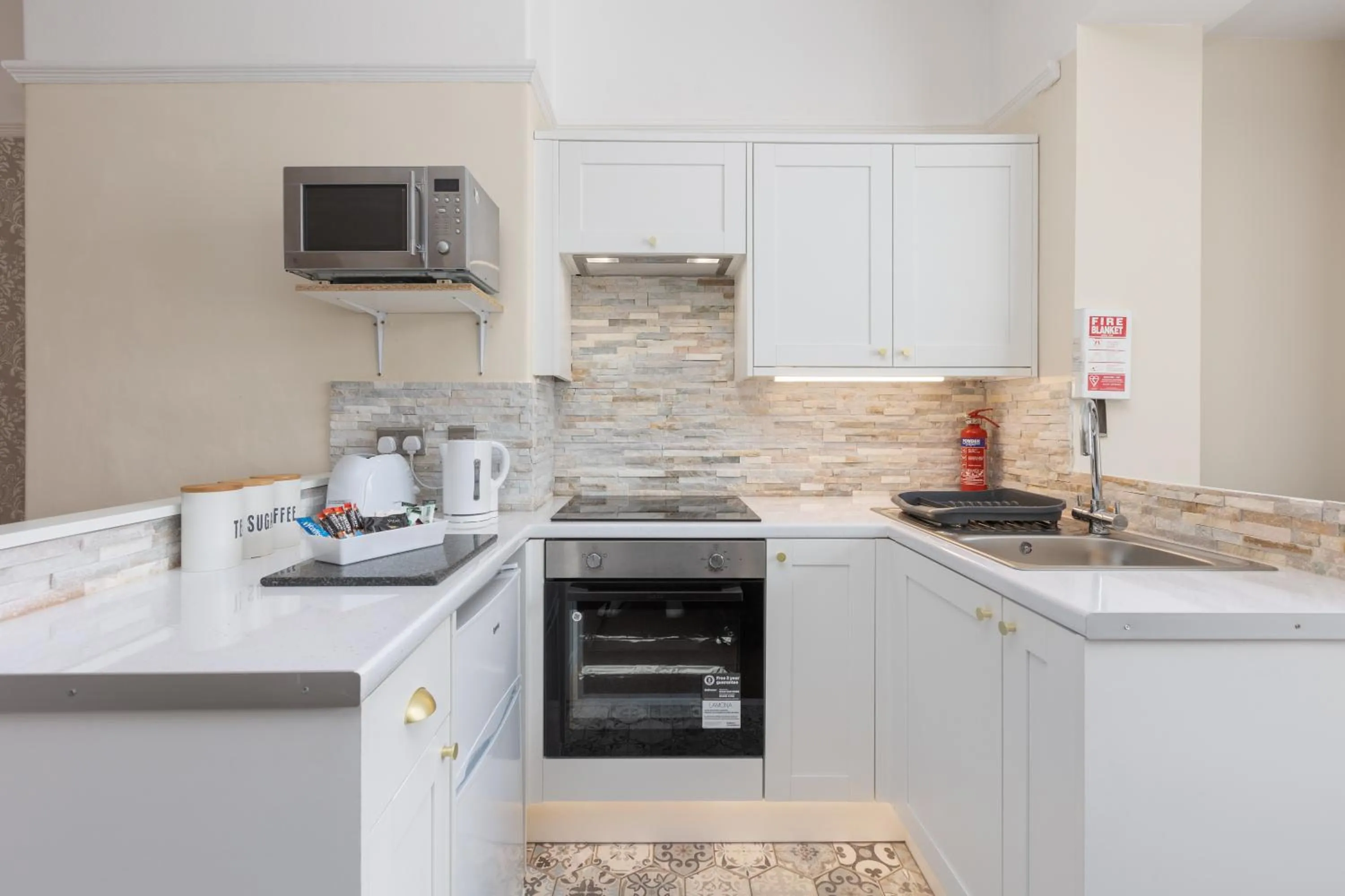 kitchen in Beachcliffe Holiday Apartments