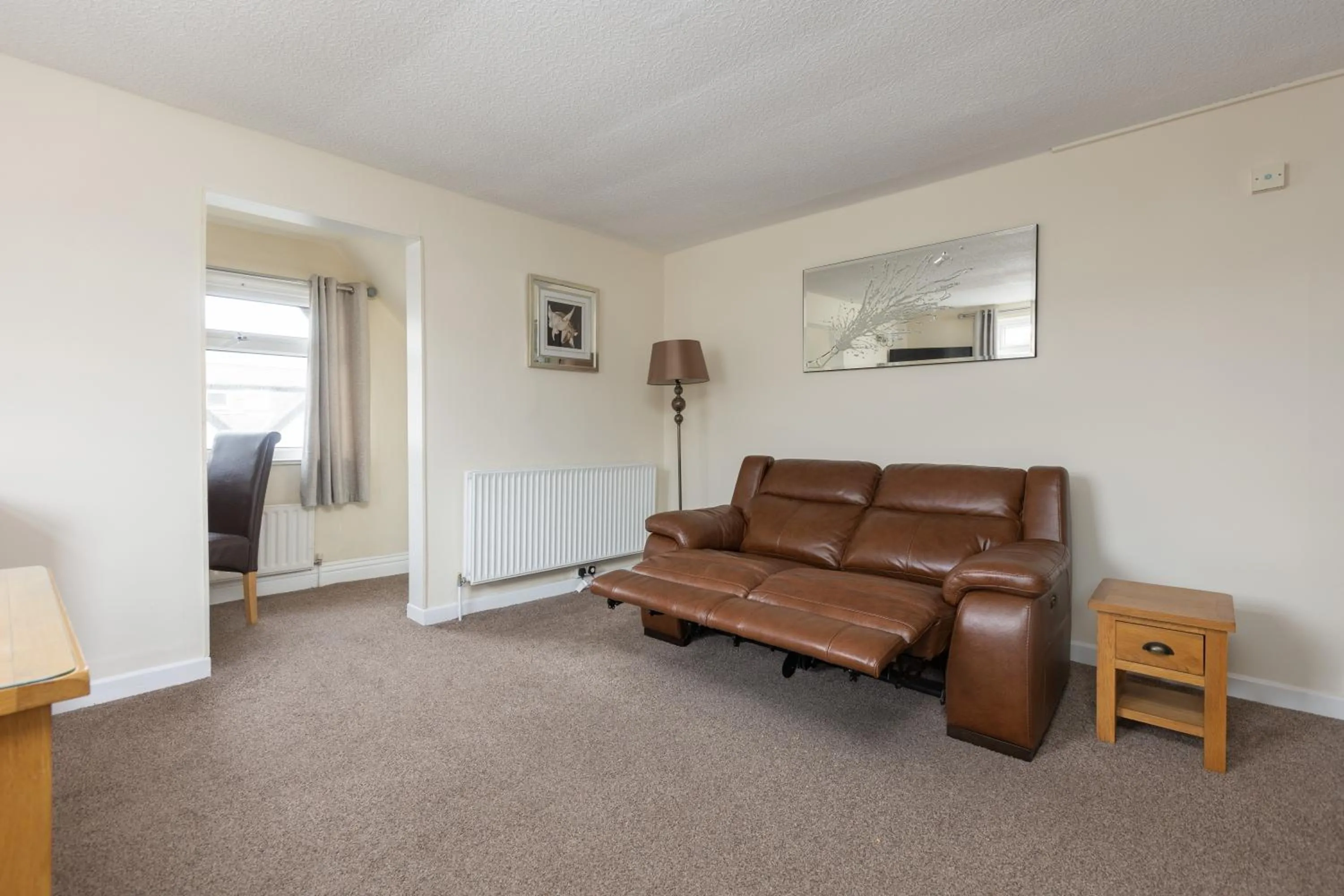 Living room in Beachcliffe Holiday Apartments