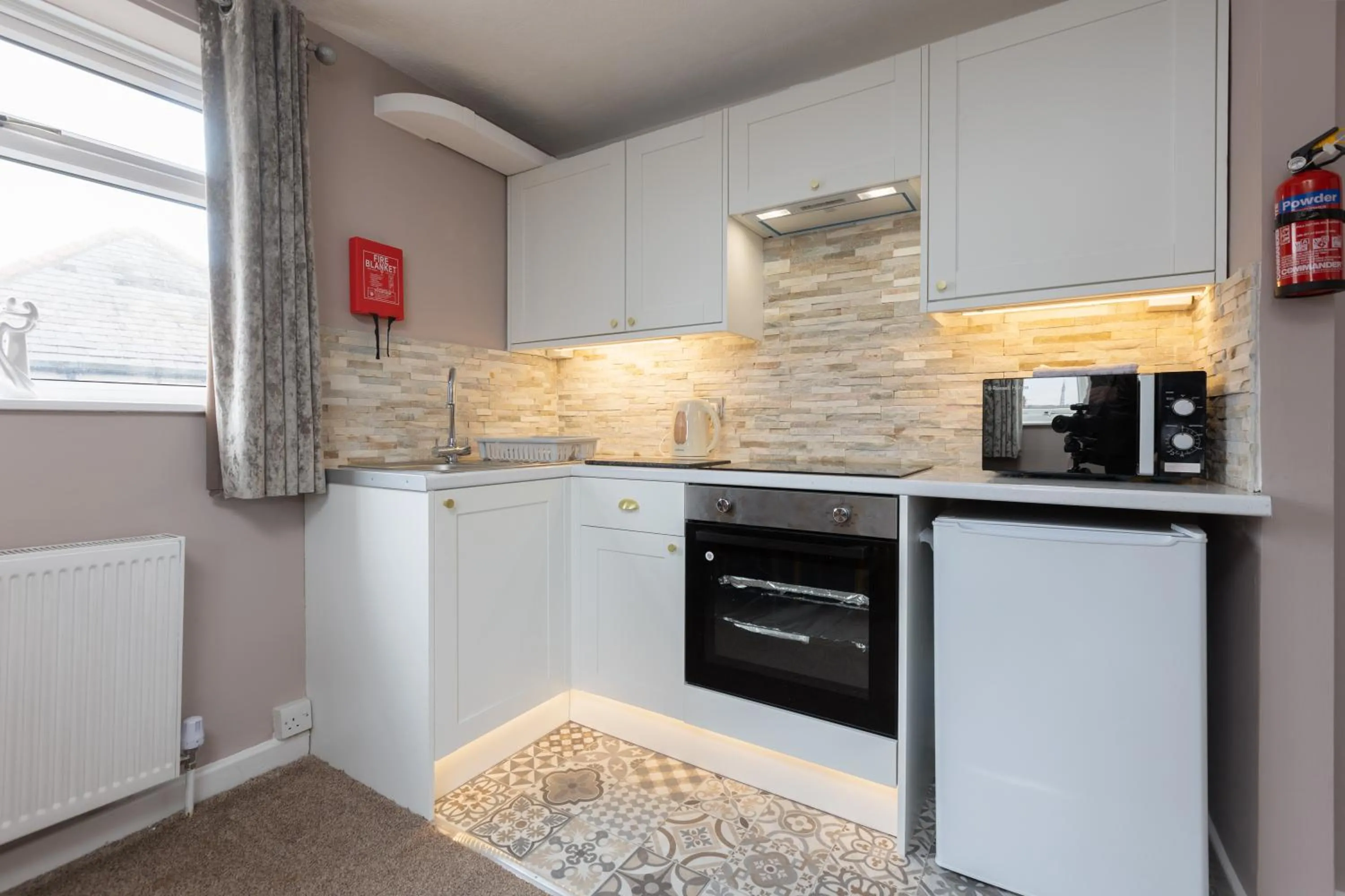 kitchen in Beachcliffe Holiday Apartments