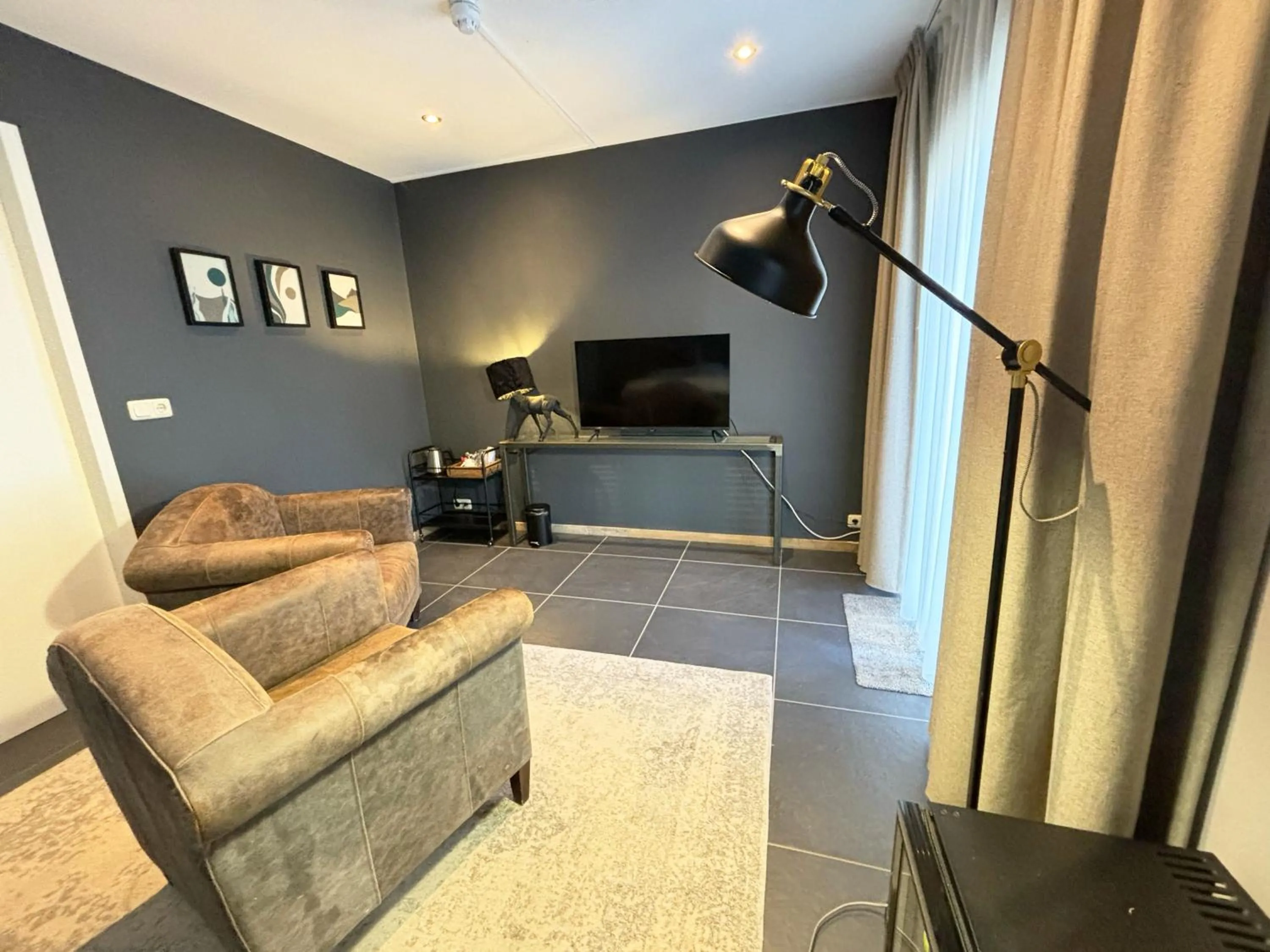 Seating area in In de Witte Dame Hotel Bar Kitchen Apartments