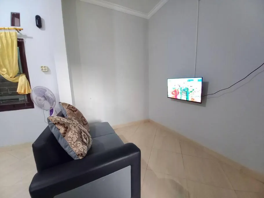 TV and multimedia in Homestay Syariah Dekat Monjali dan Jogja City Mall by Simply Homy