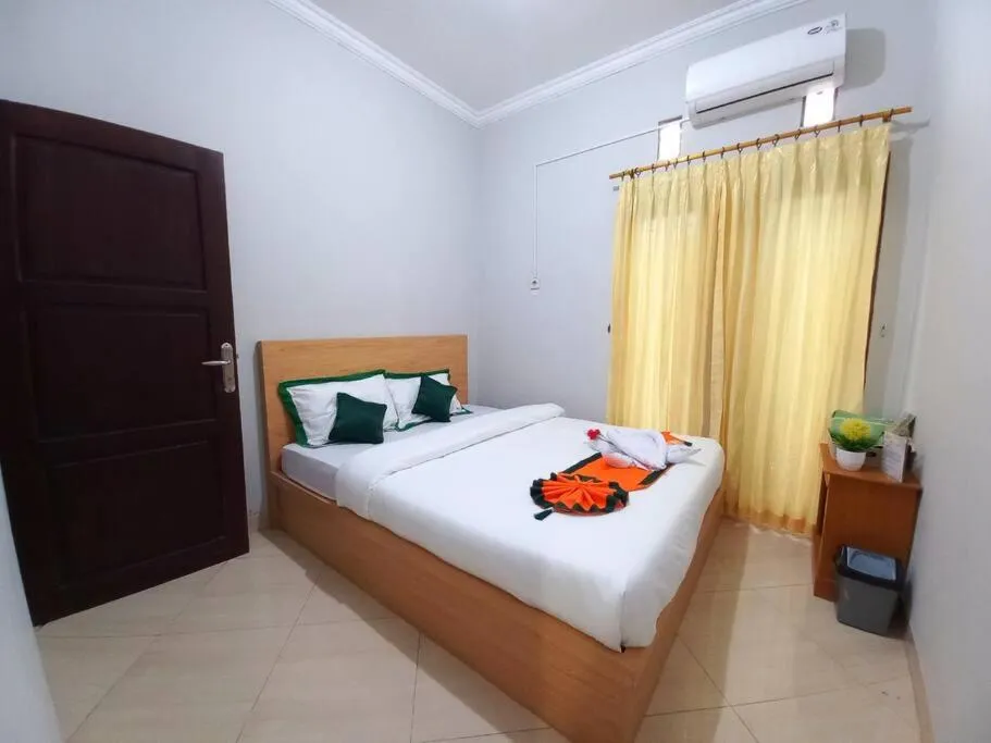 Bed in Homestay Syariah Dekat Monjali dan Jogja City Mall by Simply Homy