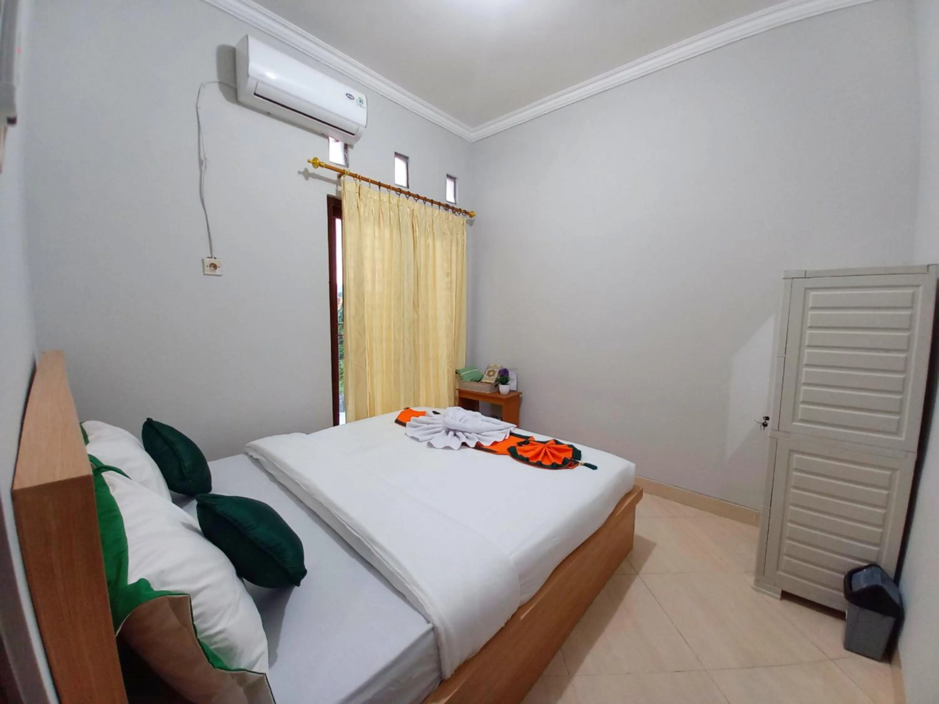 Bed in Homestay Syariah Dekat Monjali dan Jogja City Mall by Simply Homy