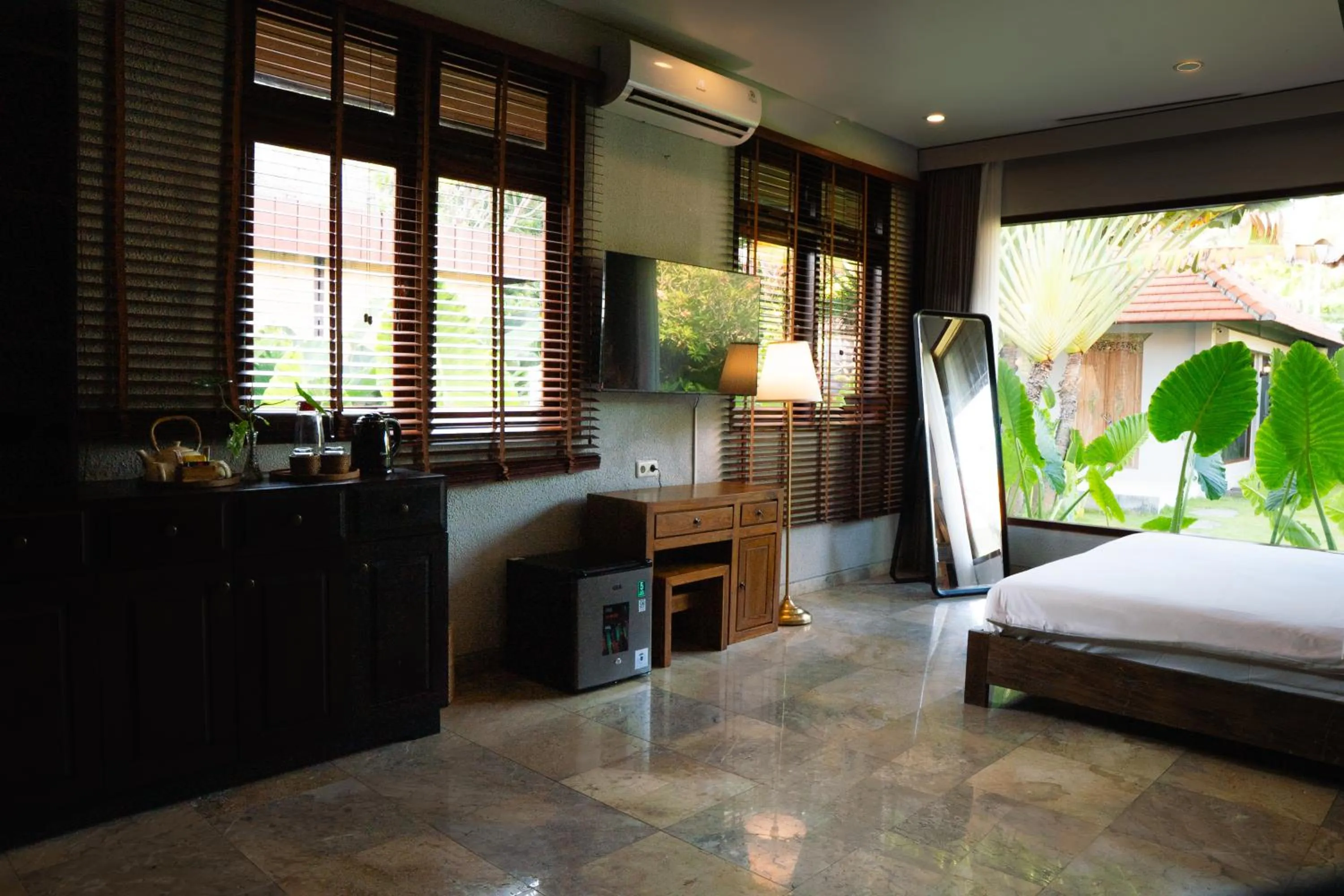 TV and multimedia, Bed in Seaside Oceana Suites by Mahaprana