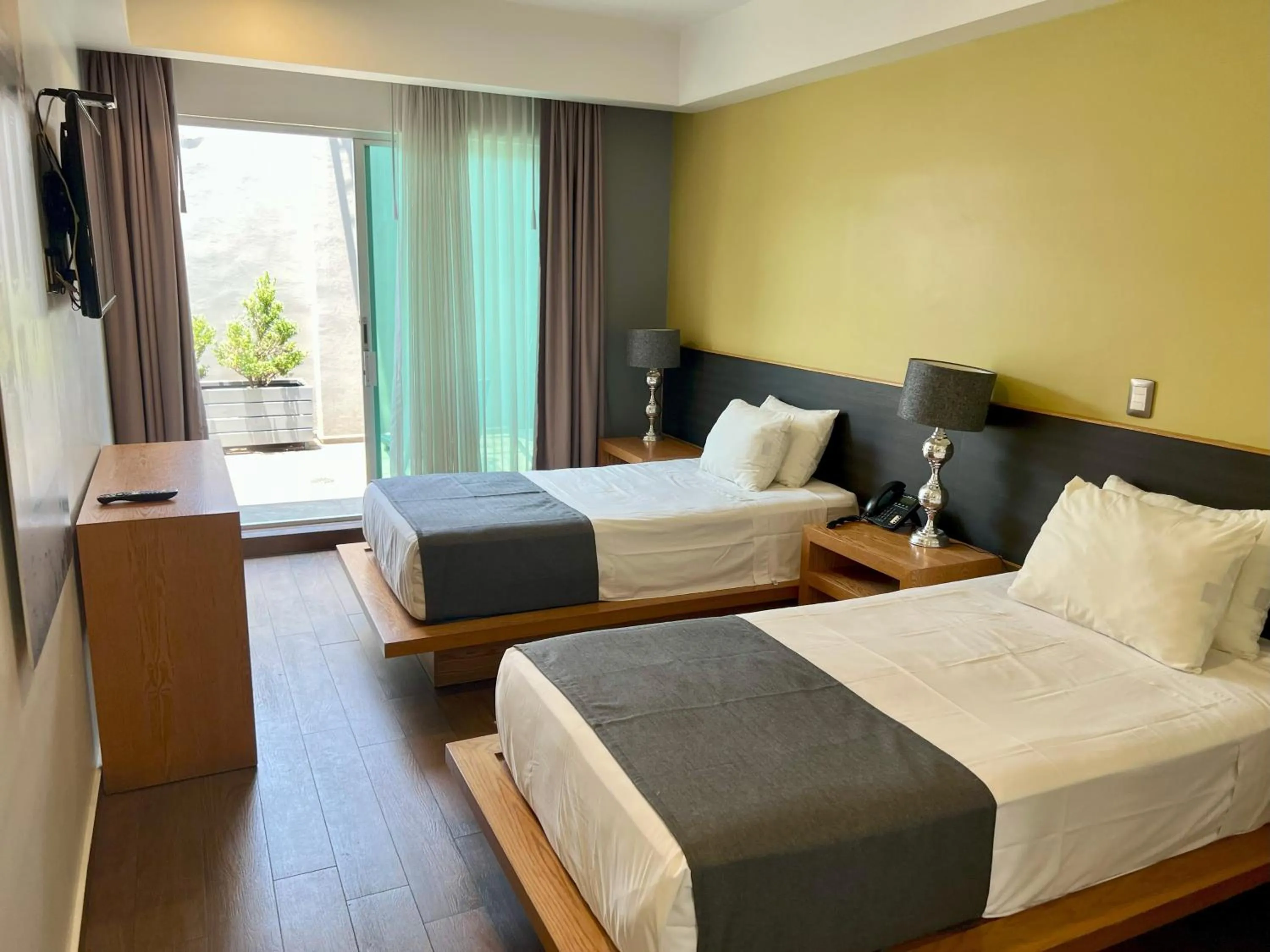 Photo of the whole room, Bed in Concept Hotel - Centro Zamora