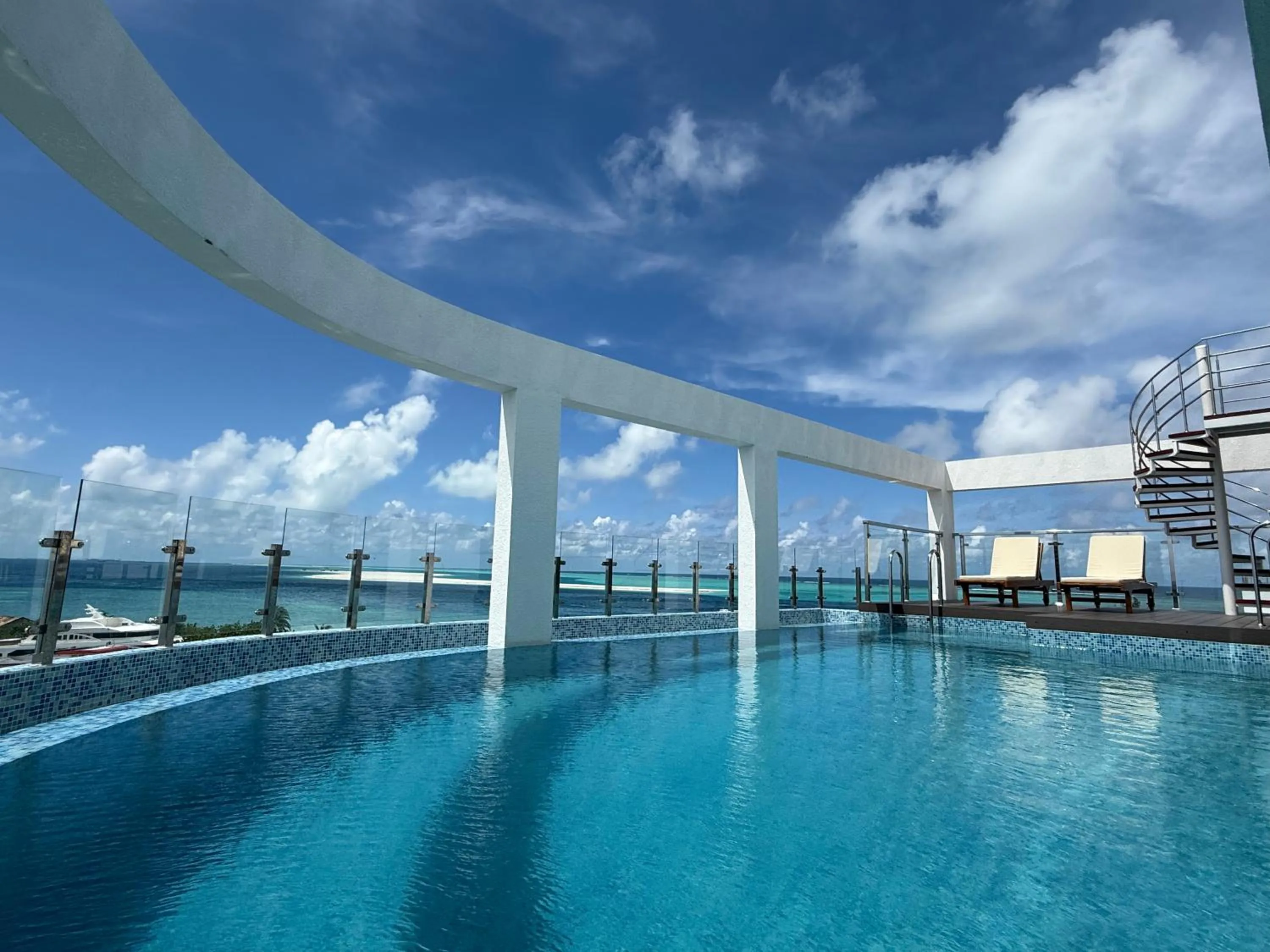 Swimming pool in Arrival Beach and Spa