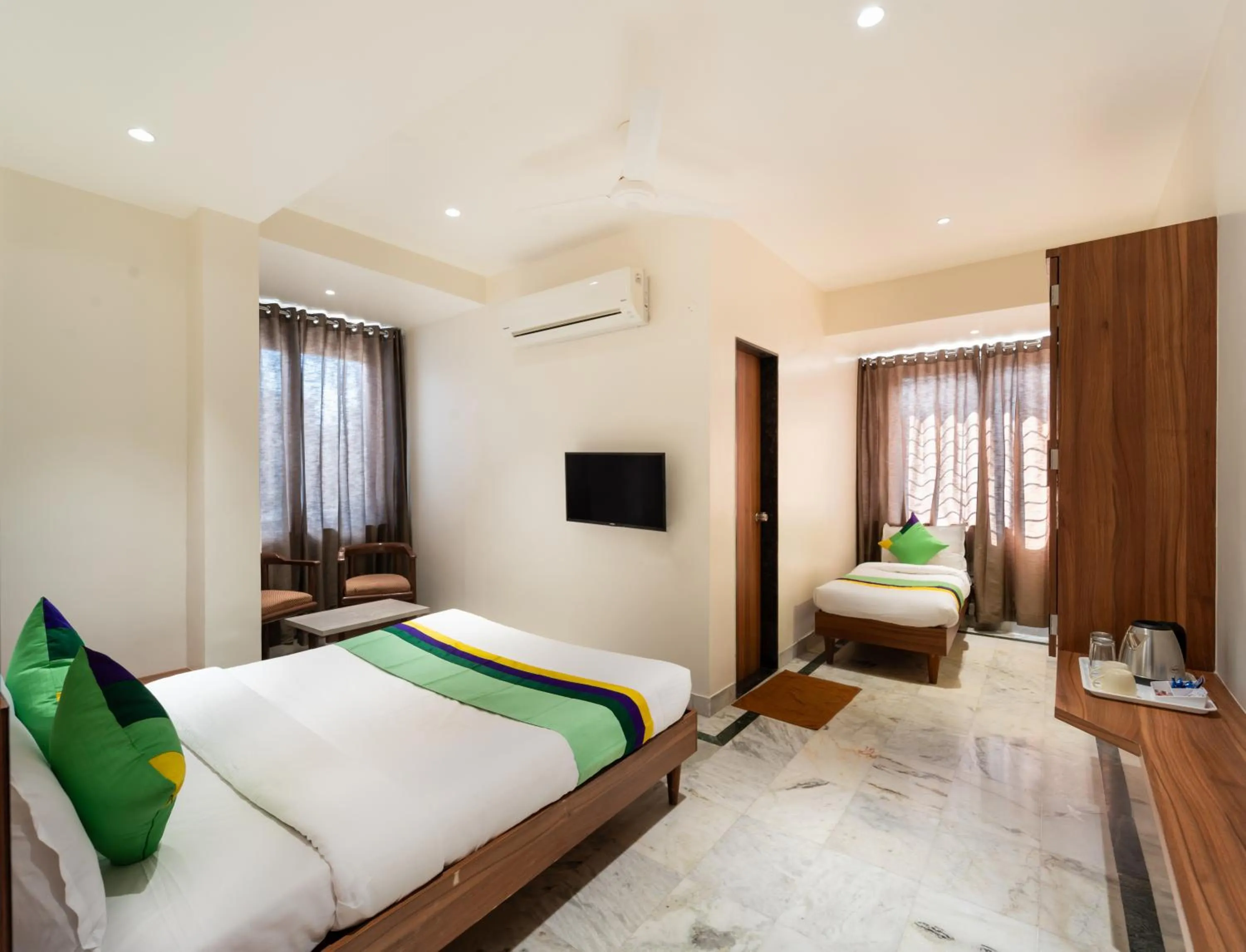 Bed in Treebo Kaveri