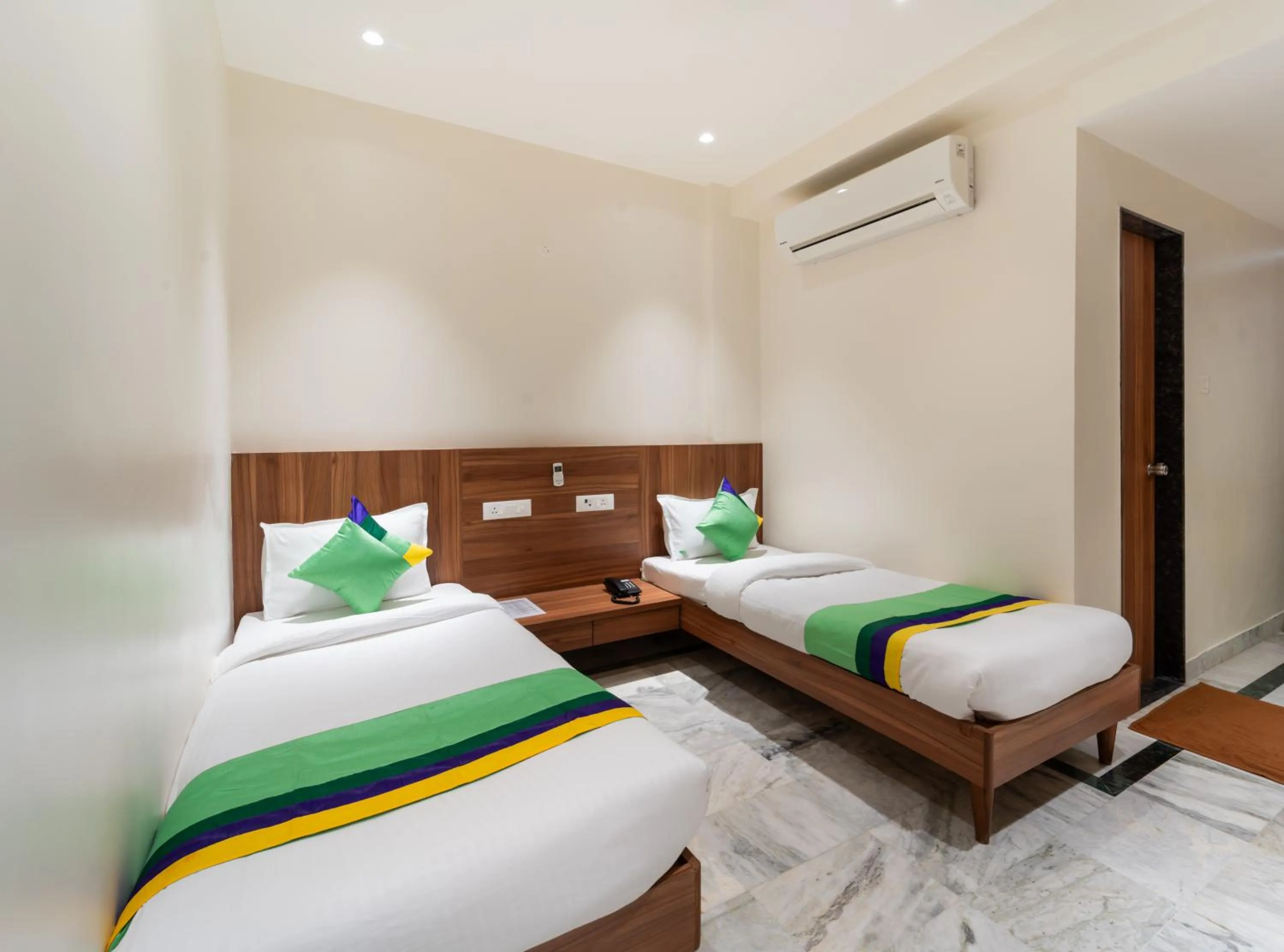 Bed in Treebo Kaveri