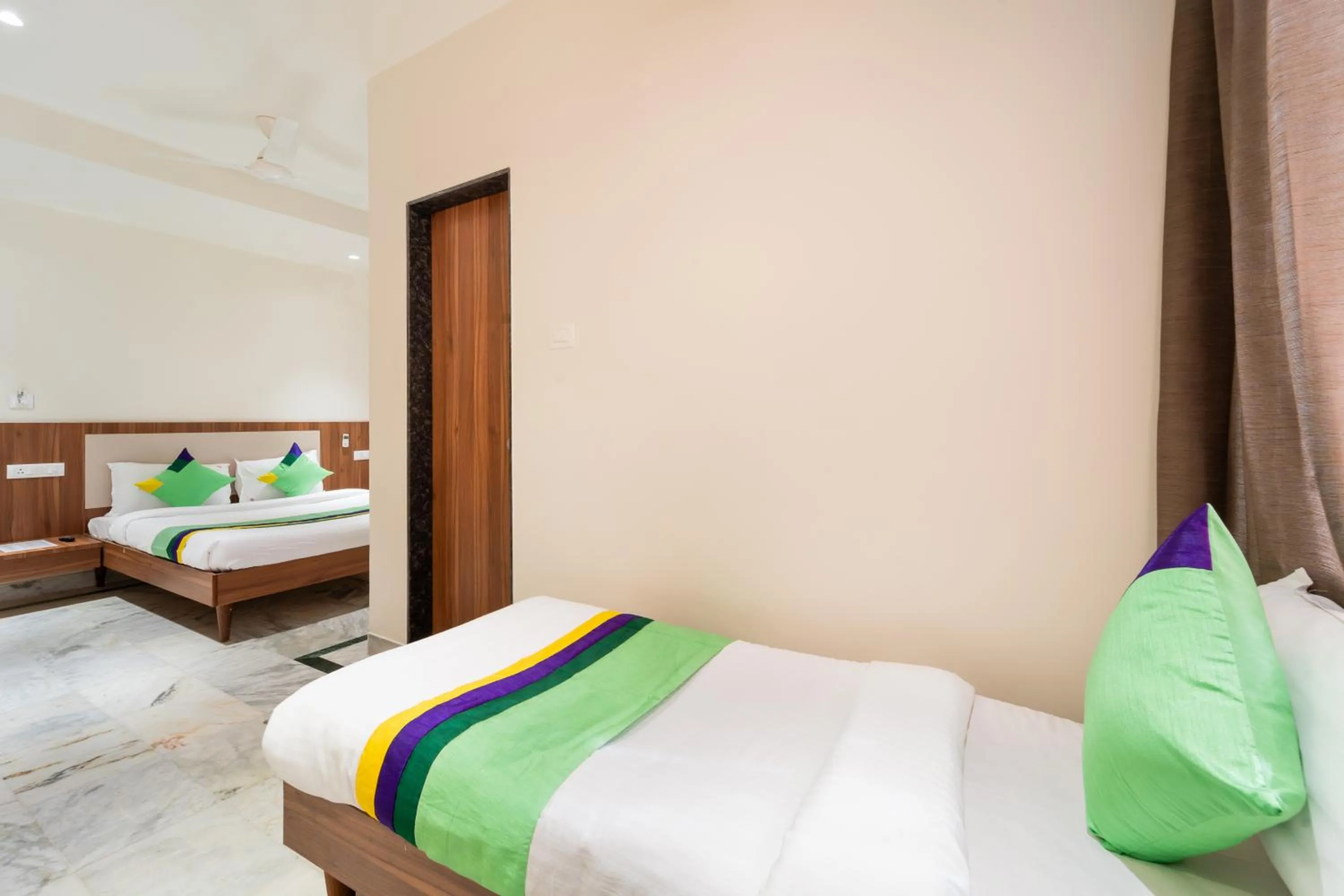 Bed in Treebo Kaveri