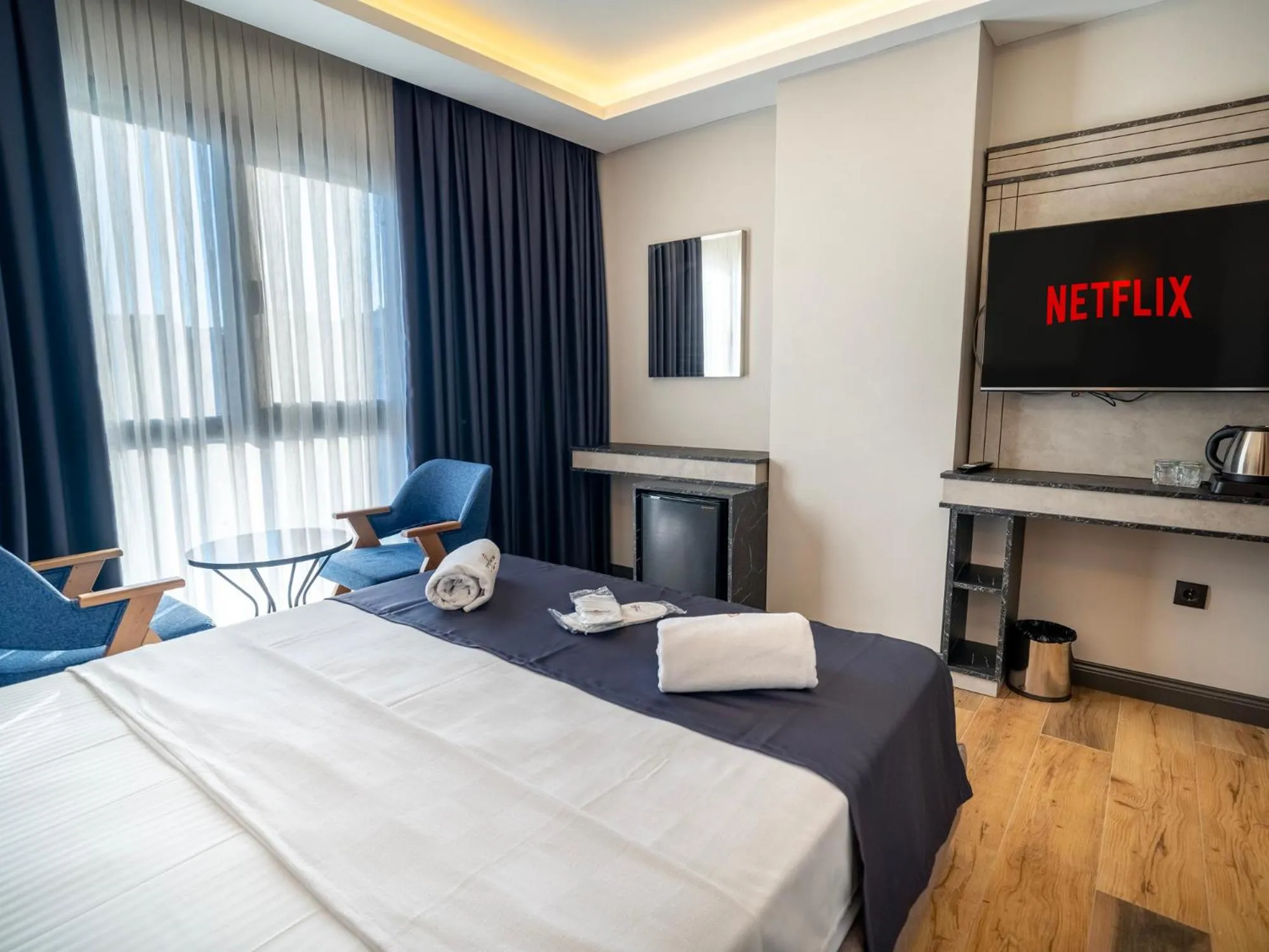 Bed in Modernlux Hotel