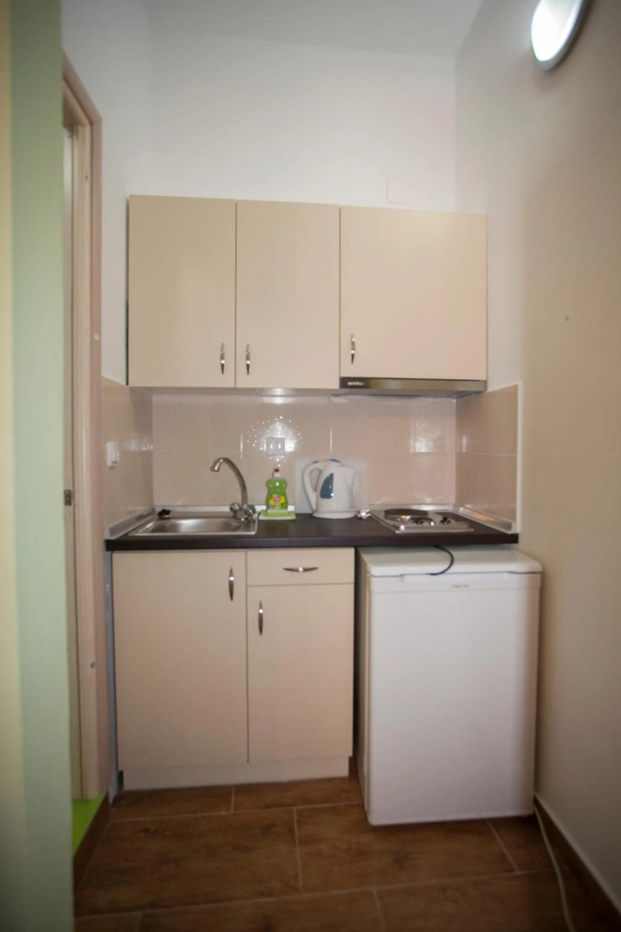 Kitchen or kitchenette in Paraskevi's Luxury Studios