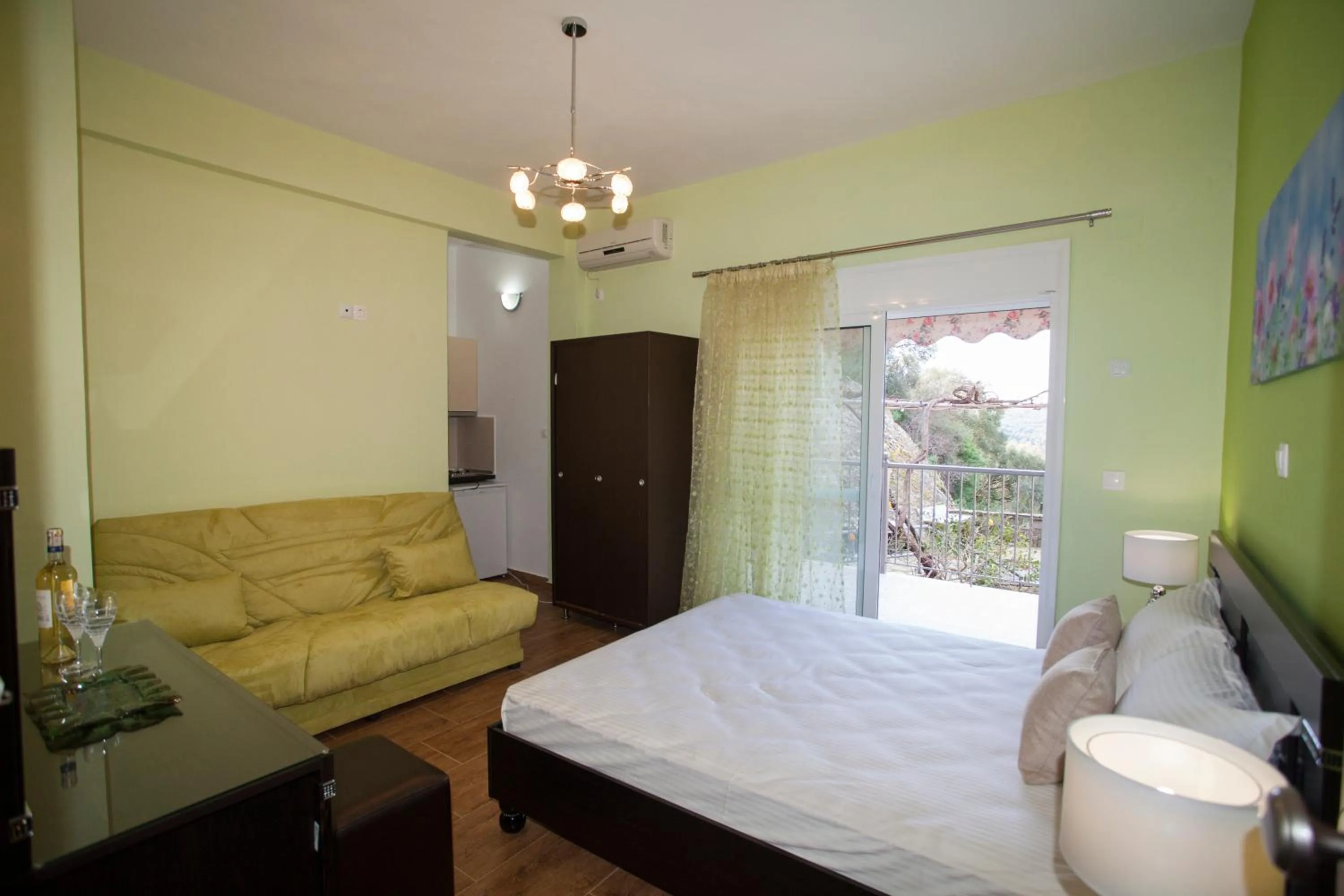 Bed in Paraskevi's Luxury Studios