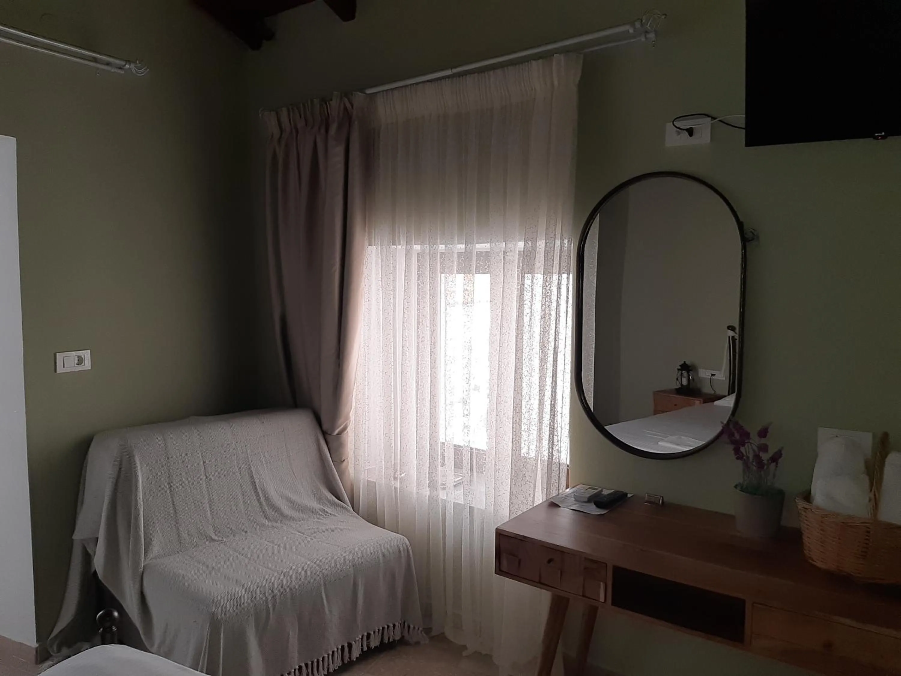 Decorative detail, Bed in Paraskevi's Luxury Studios