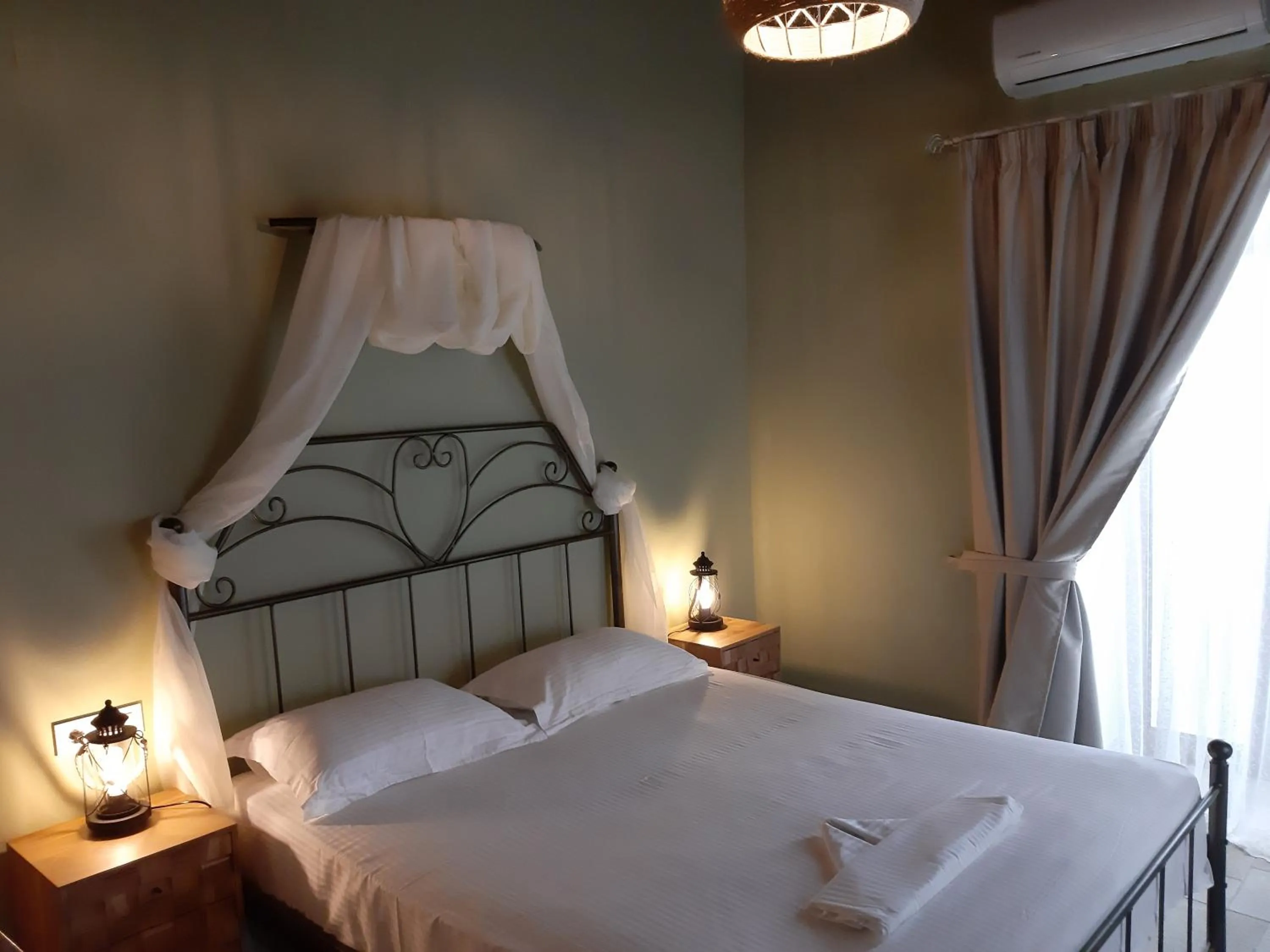 Bed in Paraskevi's Luxury Studios