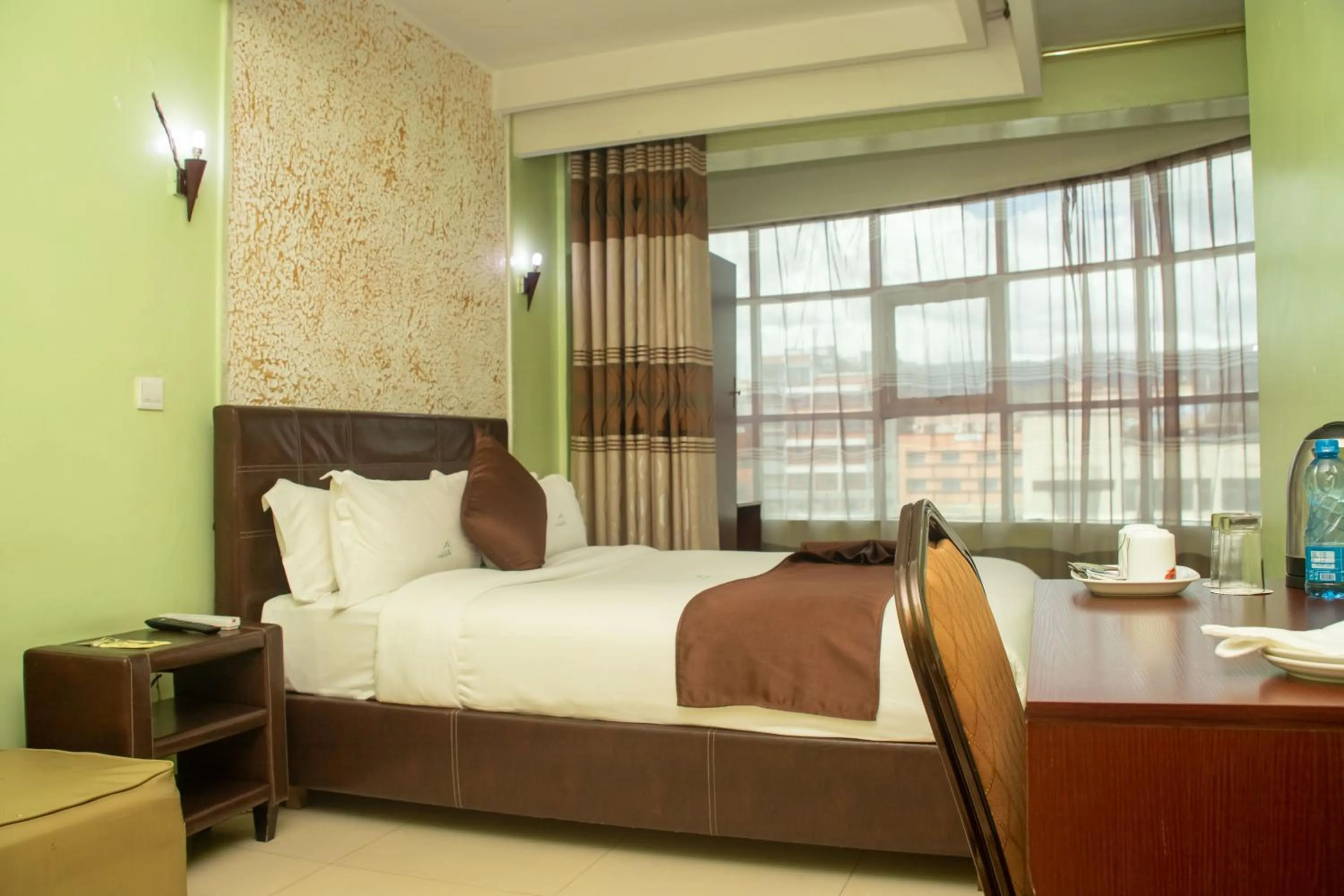 Bedroom, Bed in Legacy Hotel and Conference Centre ltd