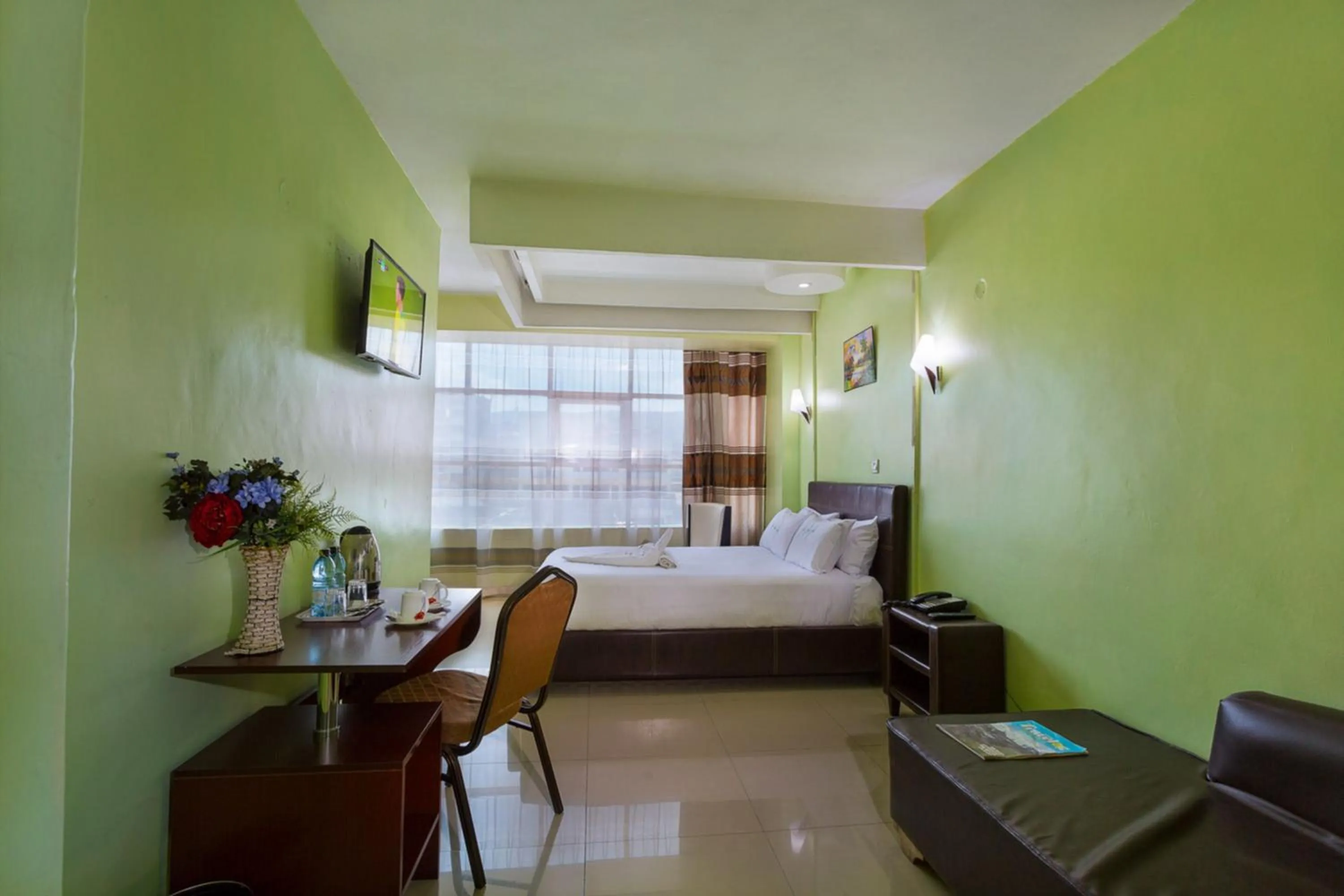 Bed in Legacy Hotel and Conference Centre ltd