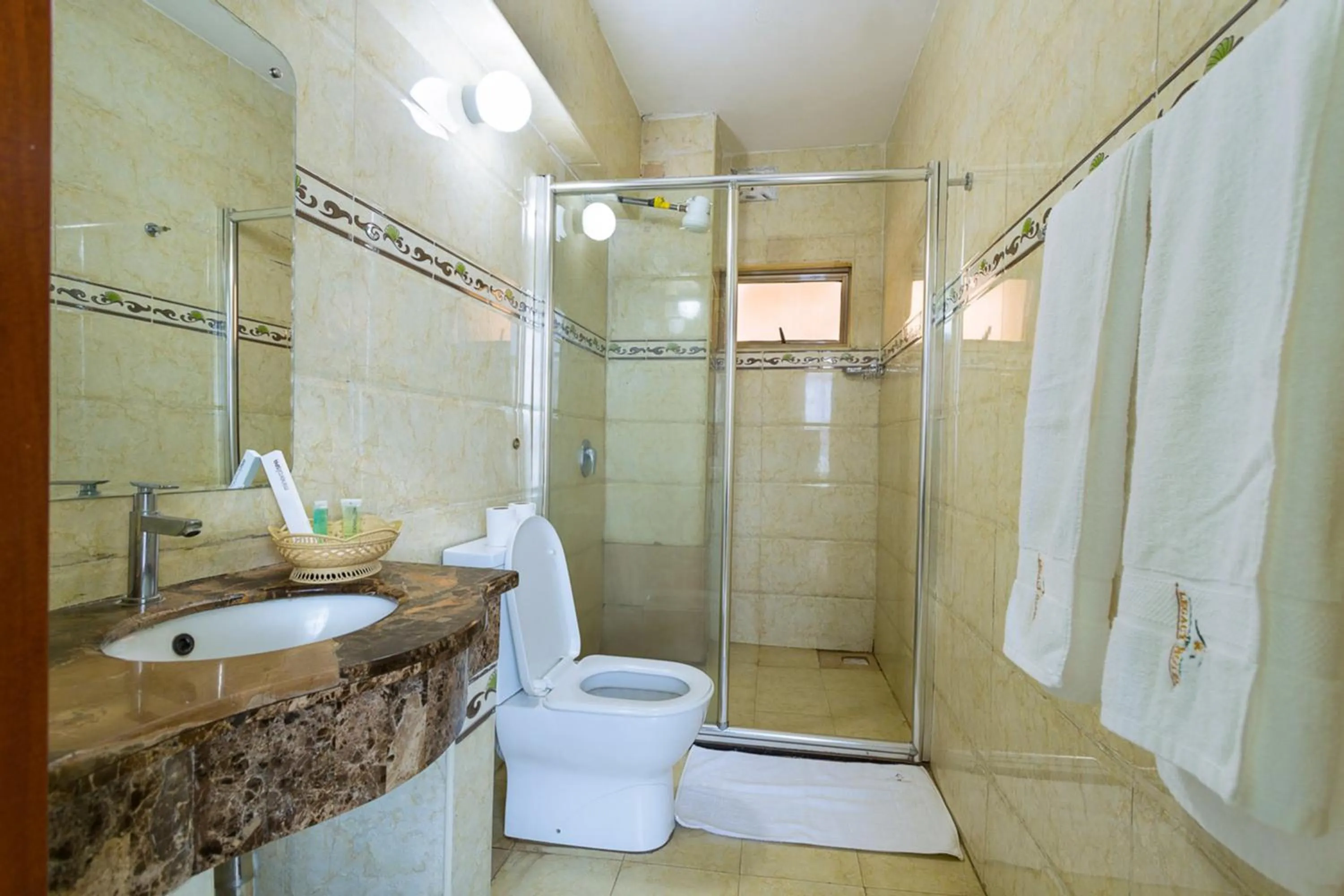 Bathroom in Legacy Hotel and Conference Centre ltd