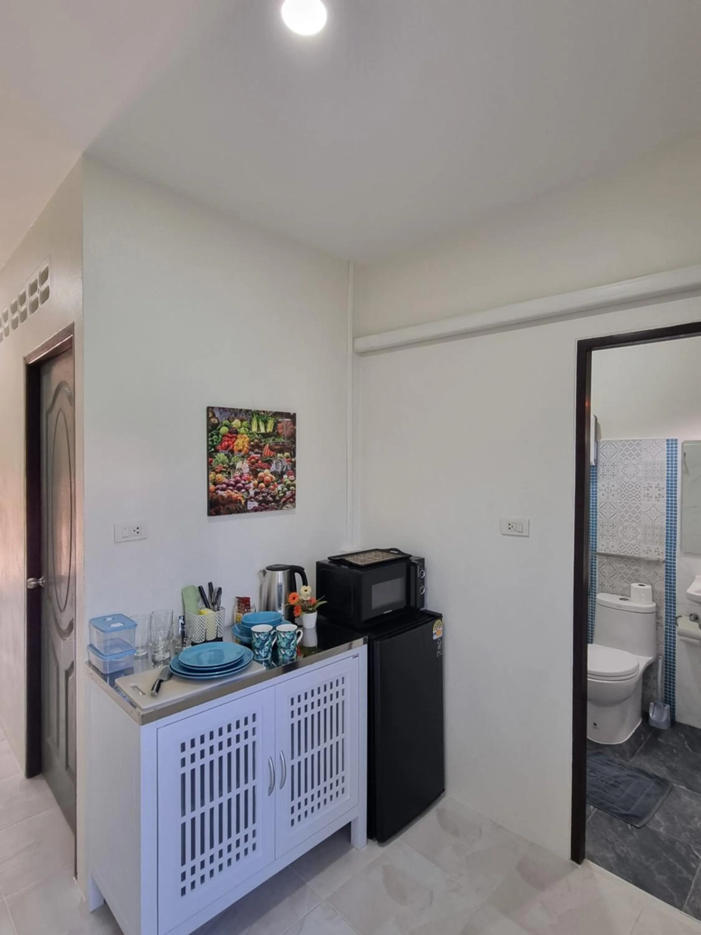 Toilet in Songbird Suites