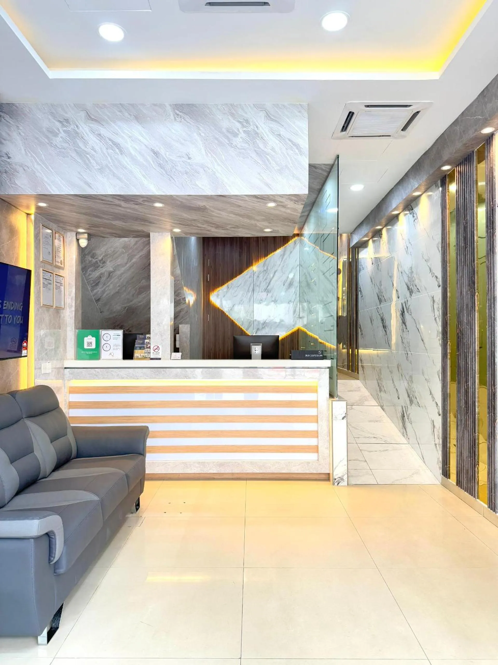 Lobby or reception in AQ Hotel
