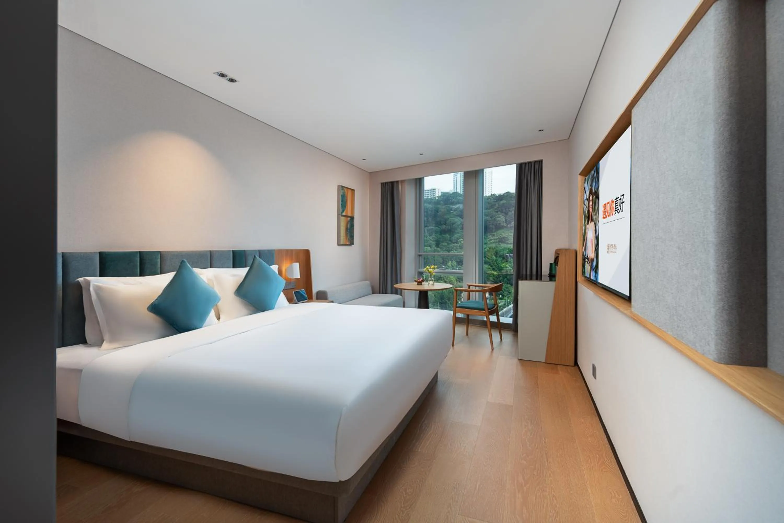 Bed in Pagoda Hotel Of SSAW ChongQing International Land-sea