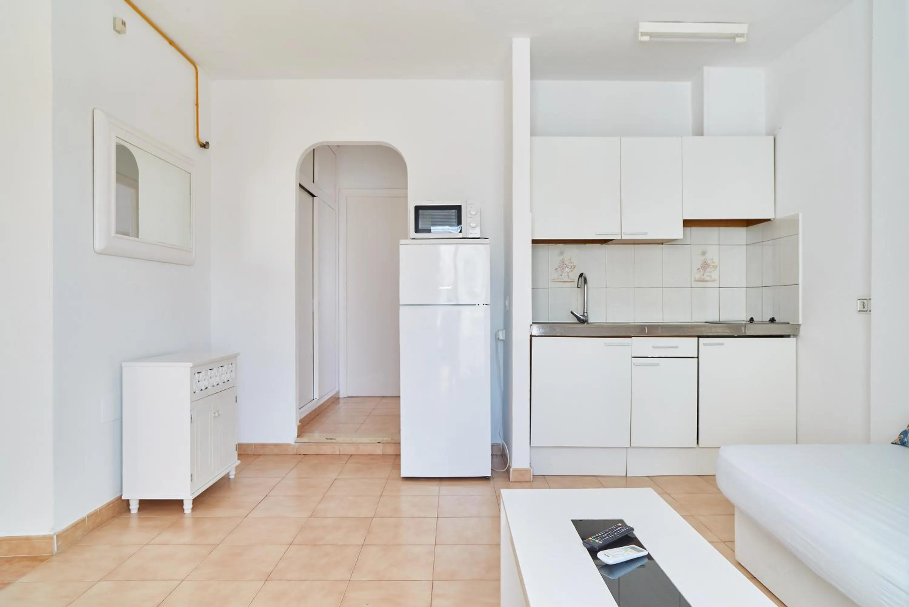Kitchen or kitchenette in Apartamentos San Antonio Beach