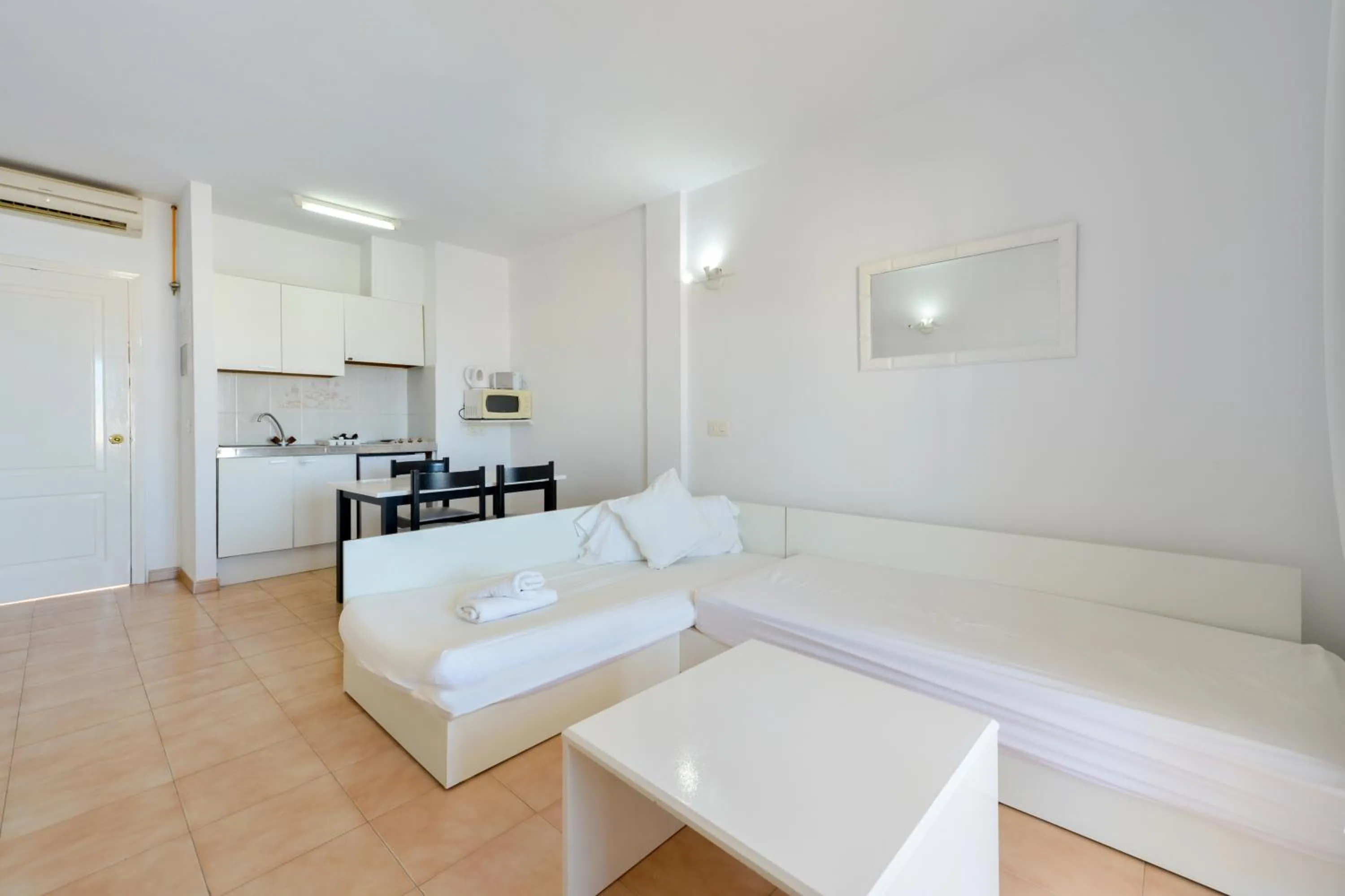 Living room in Apartamentos San Antonio Beach