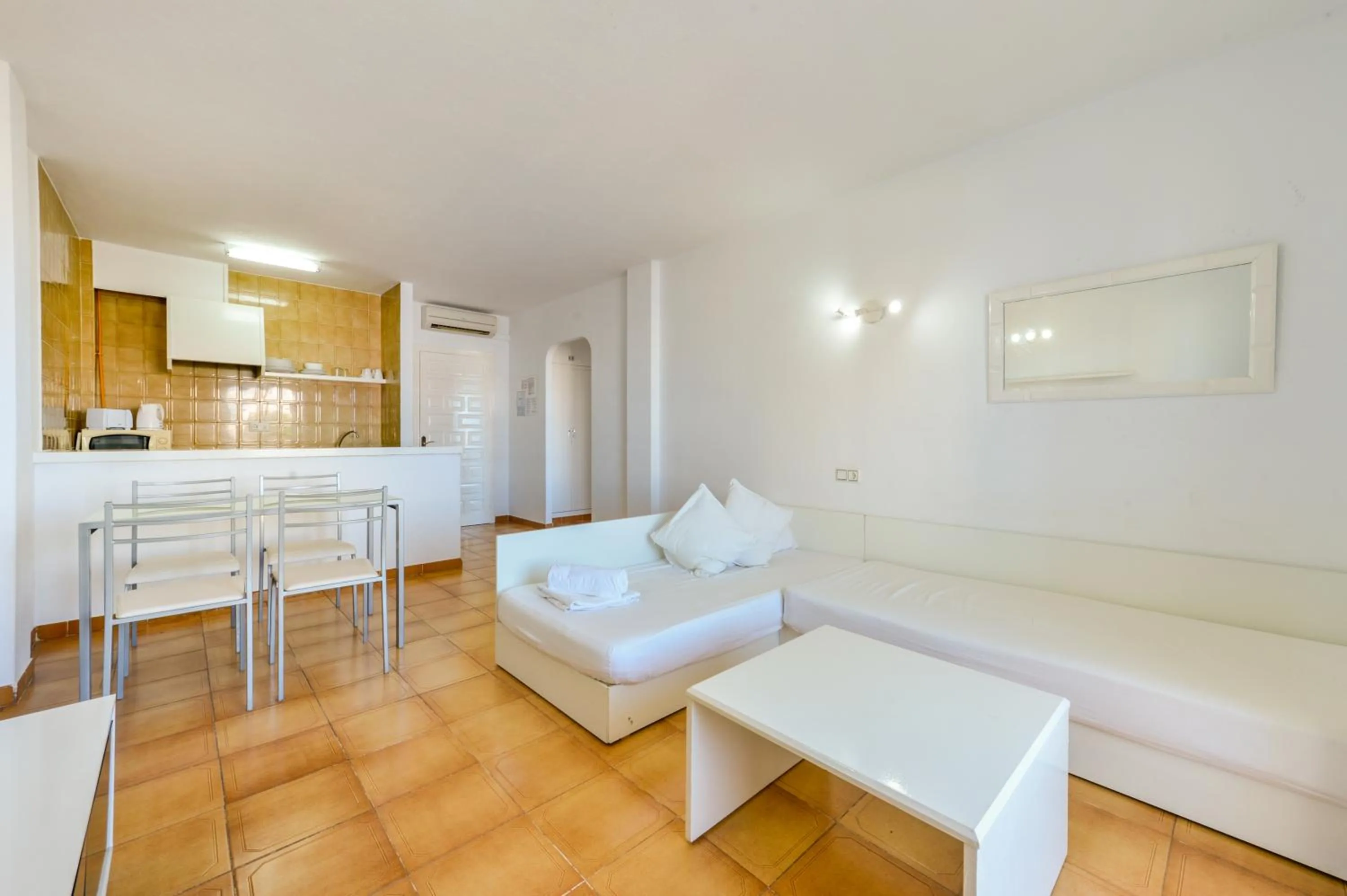 Living room in Apartamentos San Antonio Beach