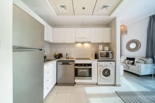Kitchen or kitchenette in Airstay - Chic Studio - Marina View - Dubai Marina - Monthly Offer Available