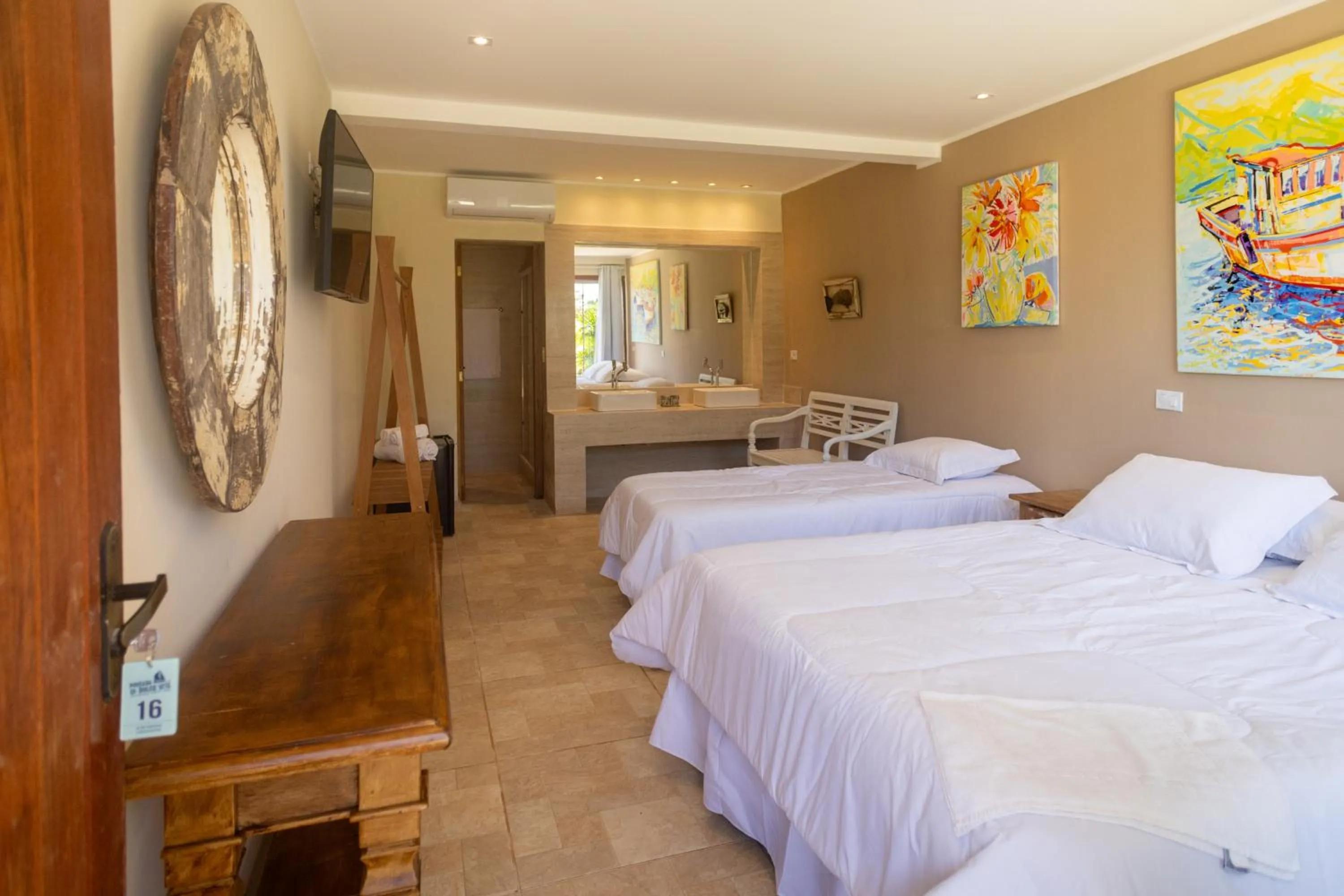 Bed in Pousada La Dolce Vita