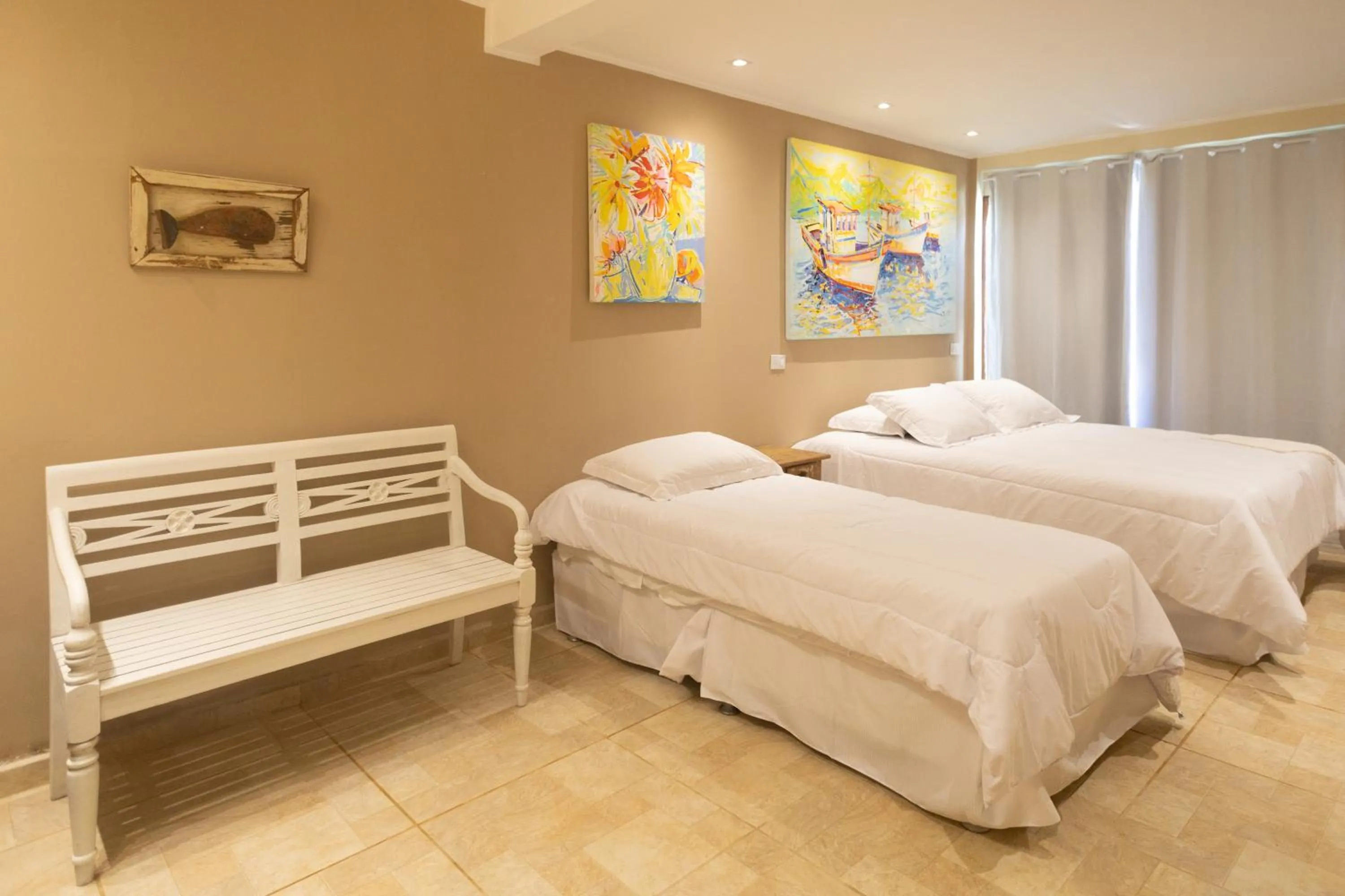 Bed in Pousada La Dolce Vita