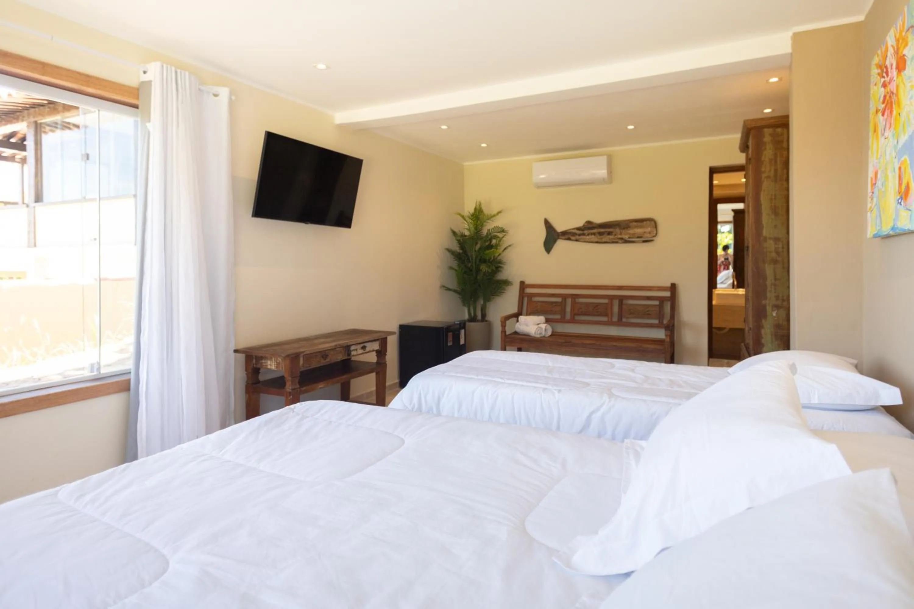 Bed in Pousada La Dolce Vita