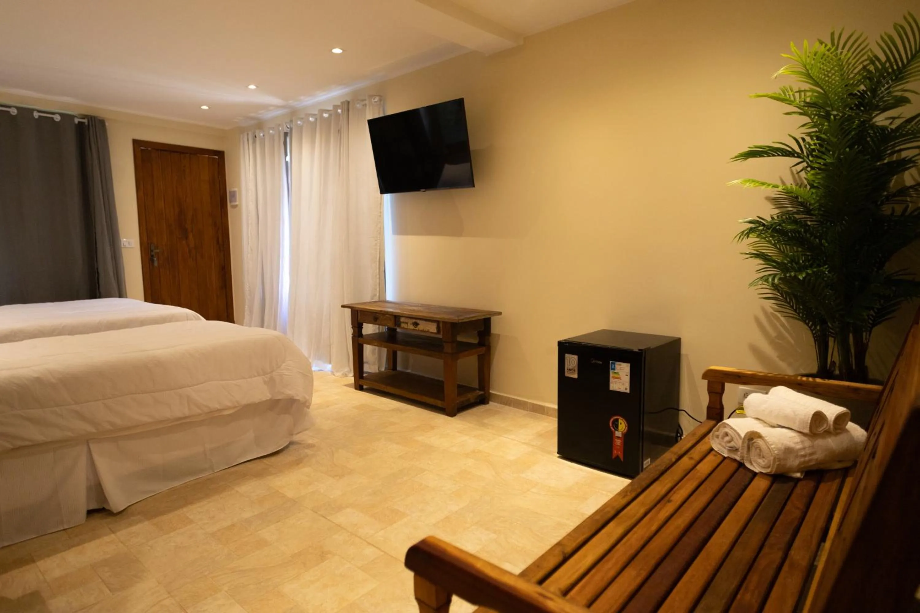 Bed in Pousada La Dolce Vita