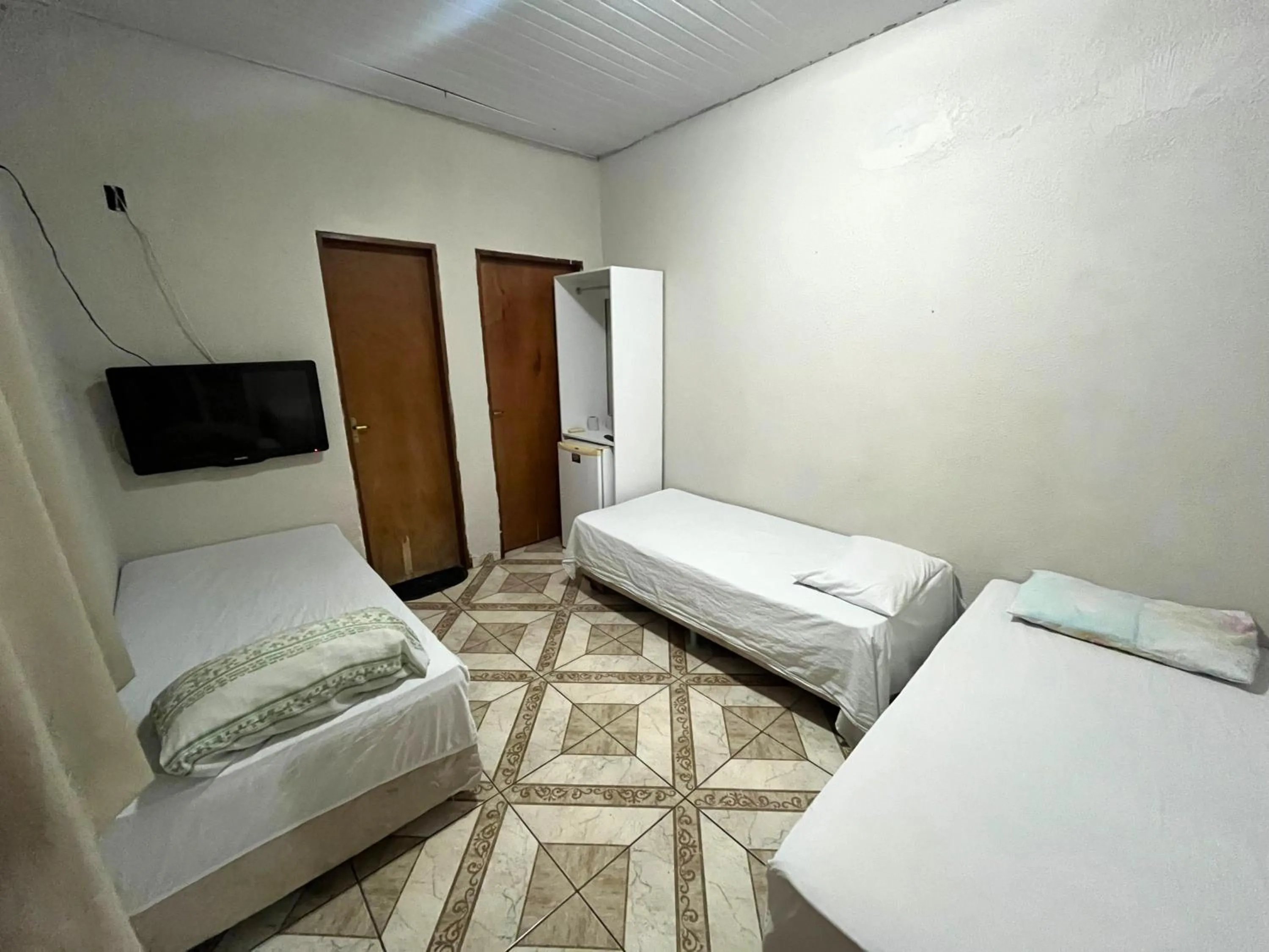 Triple Room in Pousada Estilo Brasil