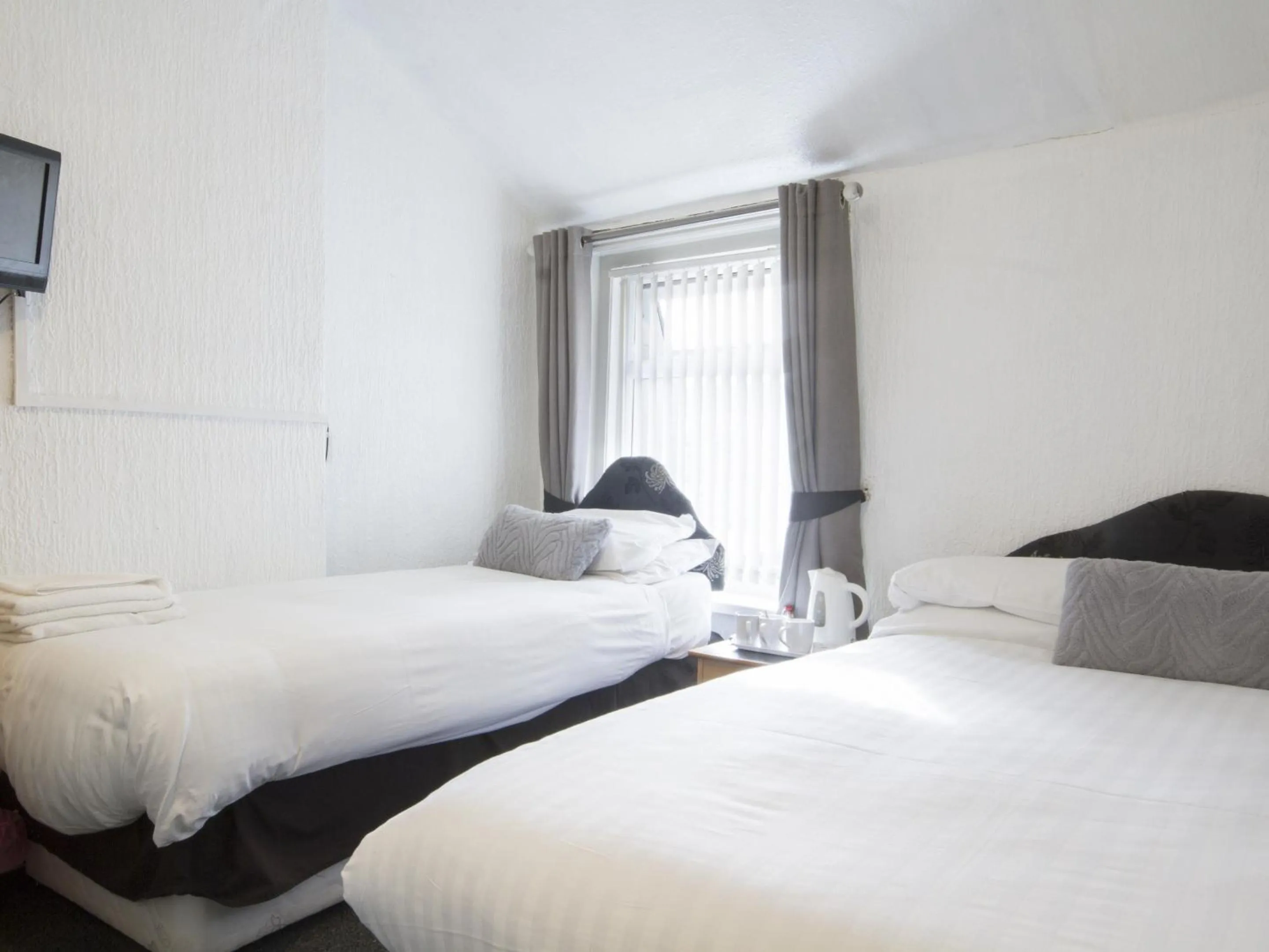 Bedroom in The Marsden Hotel