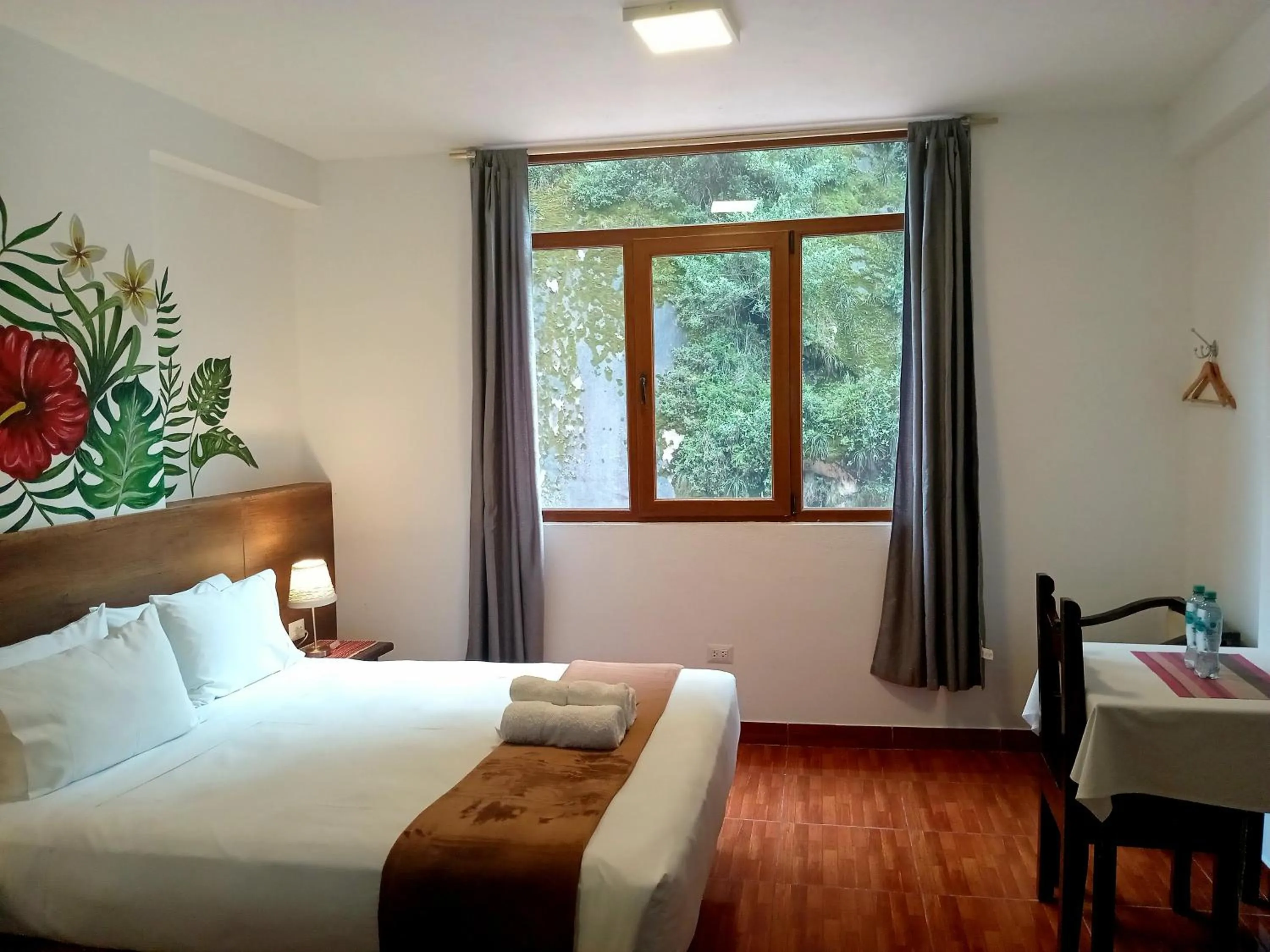 Bed in Susanna Inn MachuPicchu Hotel