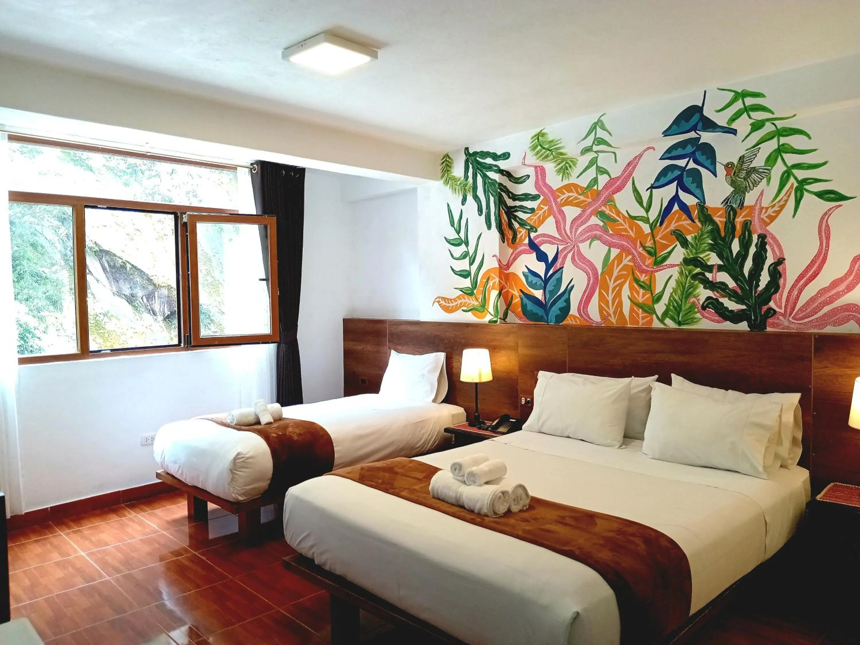 Bed in Susanna Inn MachuPicchu Hotel