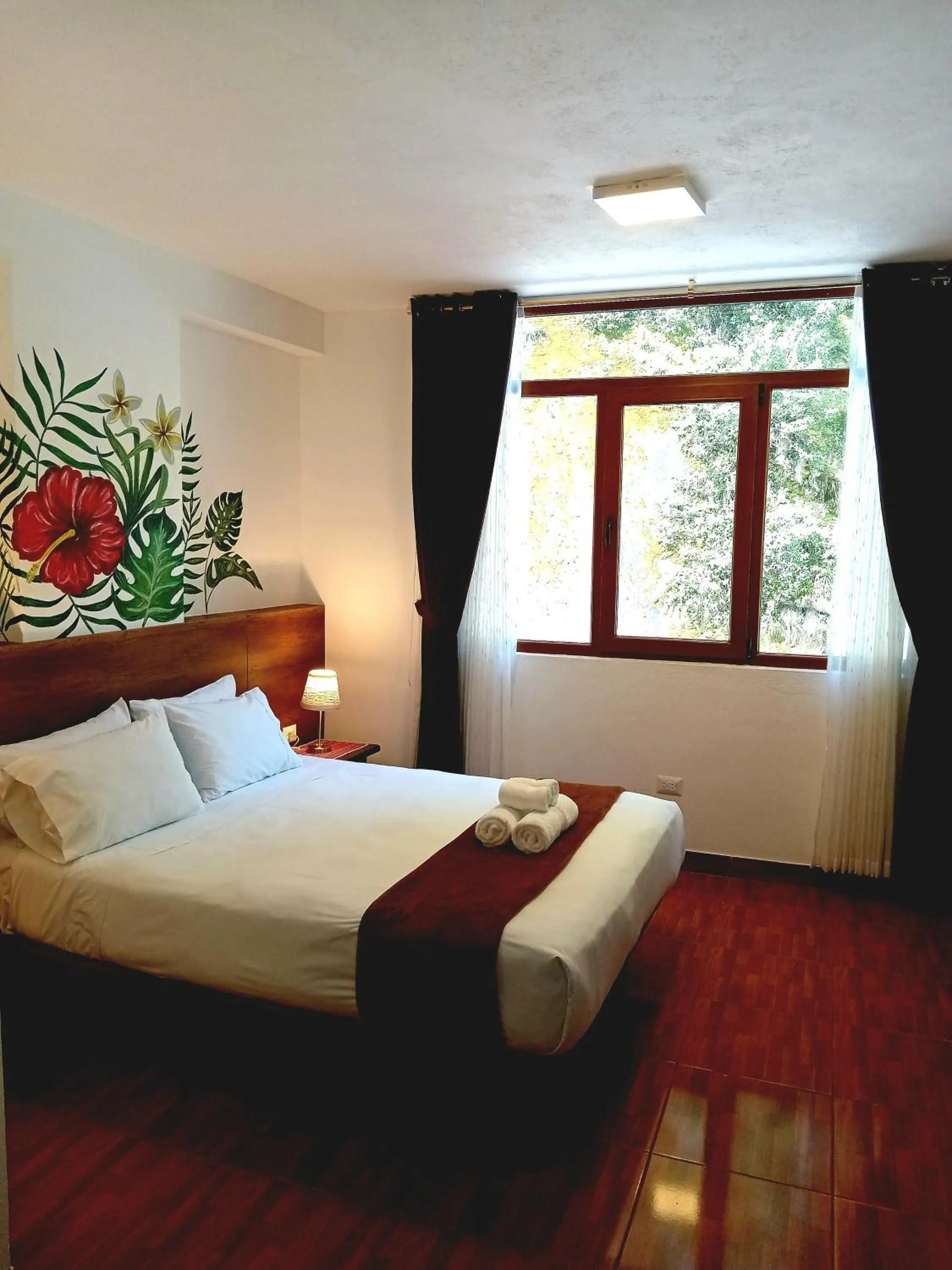 Bed in Susanna Inn MachuPicchu Hotel