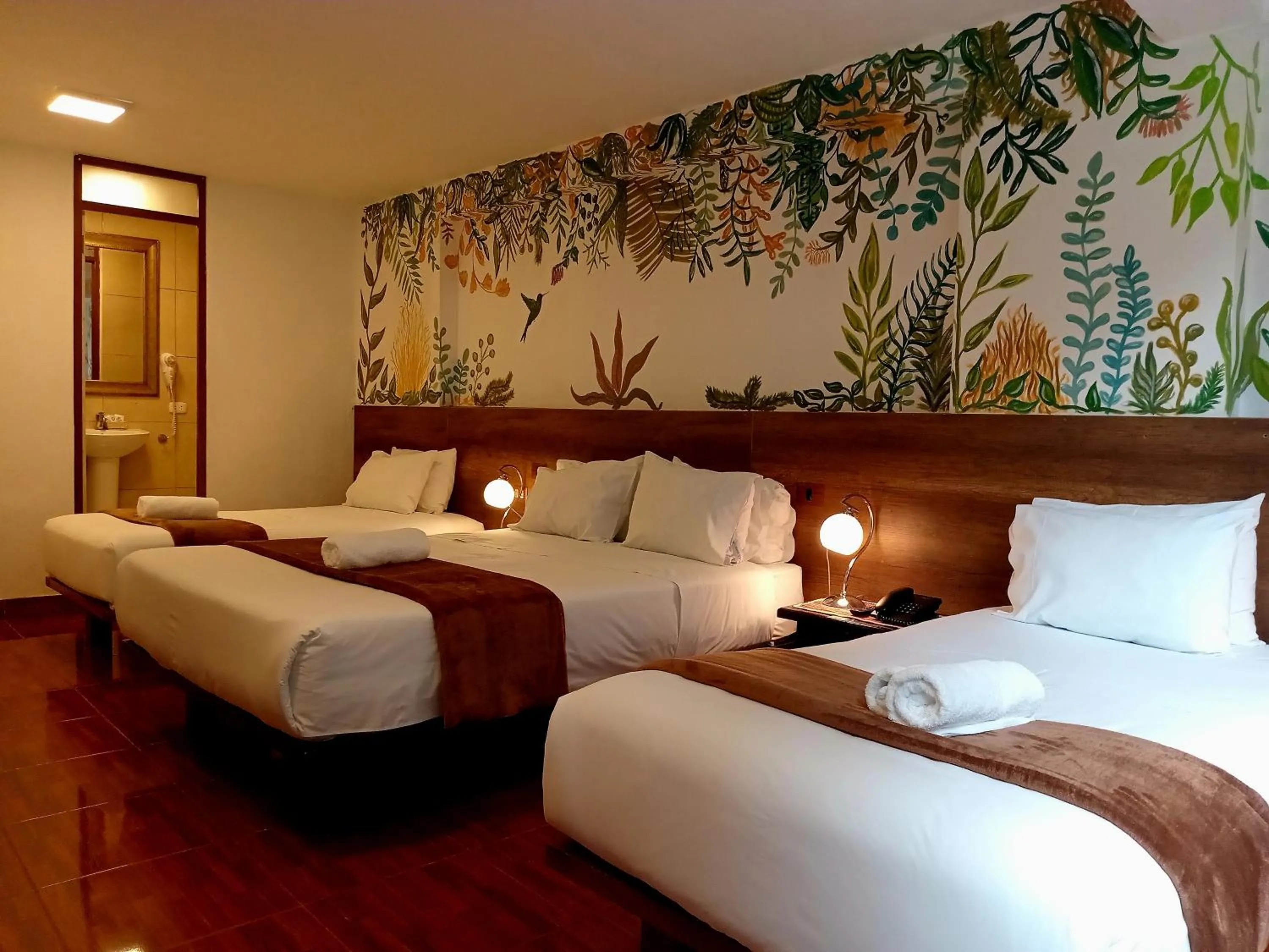 Bed in Susanna Inn MachuPicchu Hotel